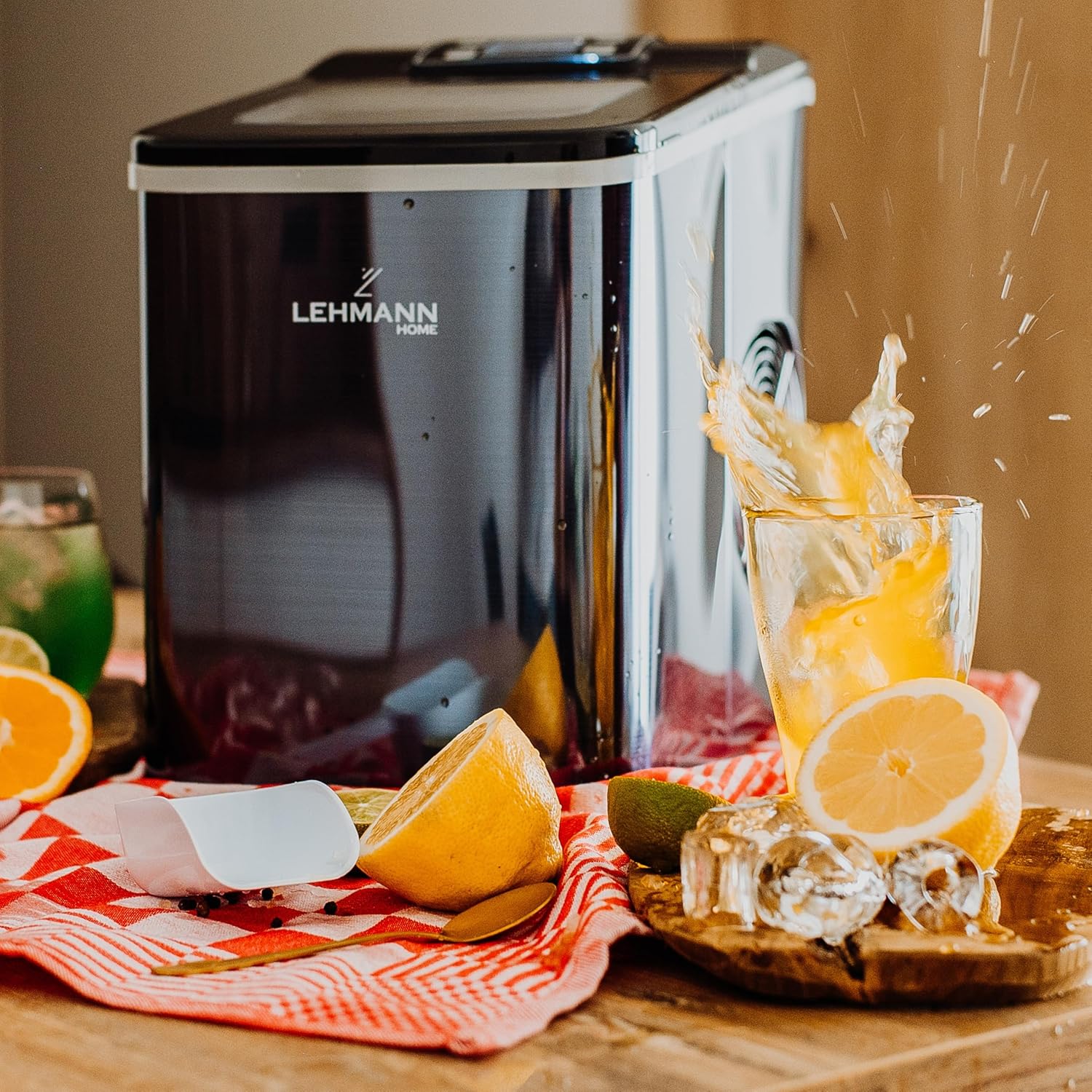LEHMANN LHOIM-1222 ice maker producing ice, with ice cubes and a glass of iced drink on a wooden surface