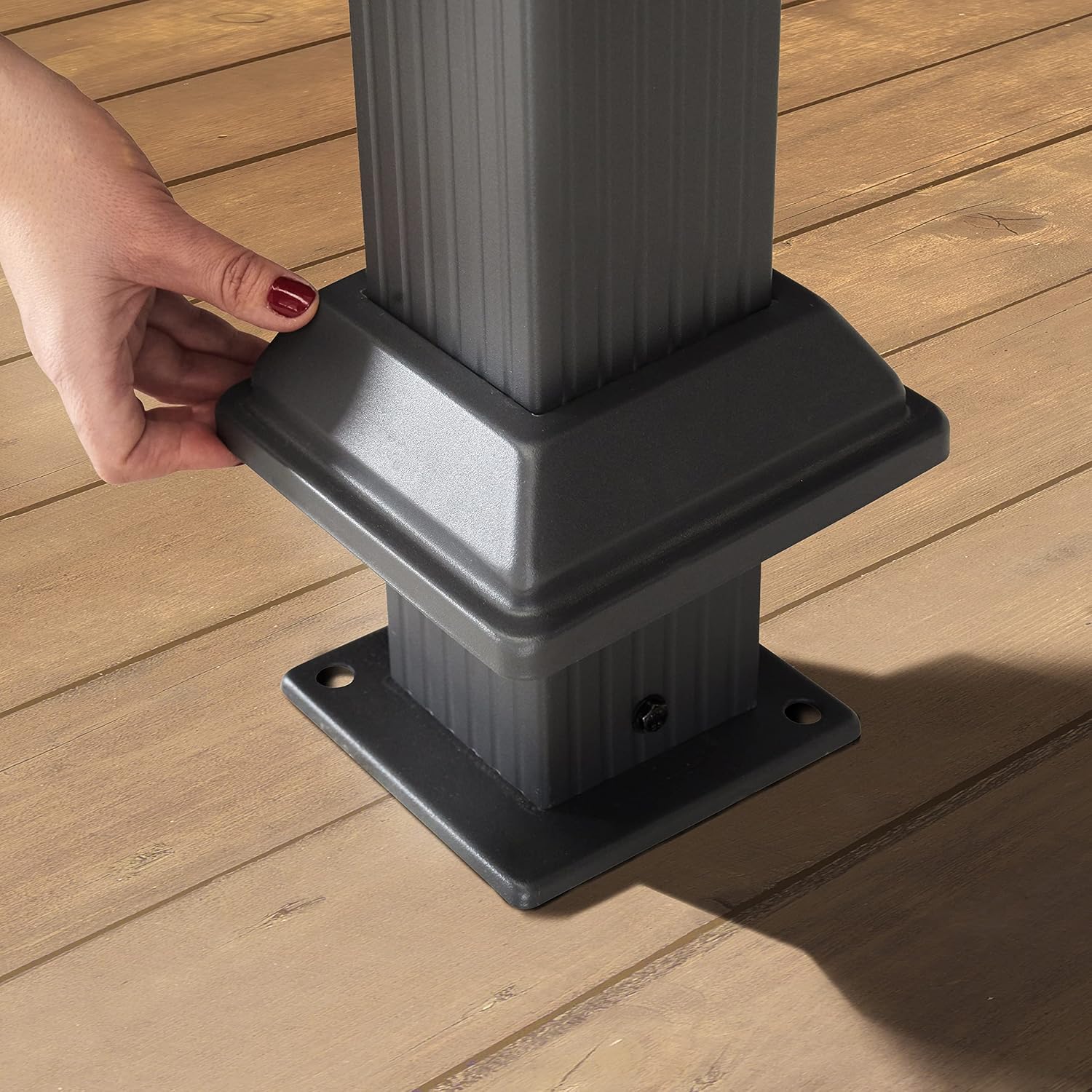 Close-up of gazebo post base with anchor points