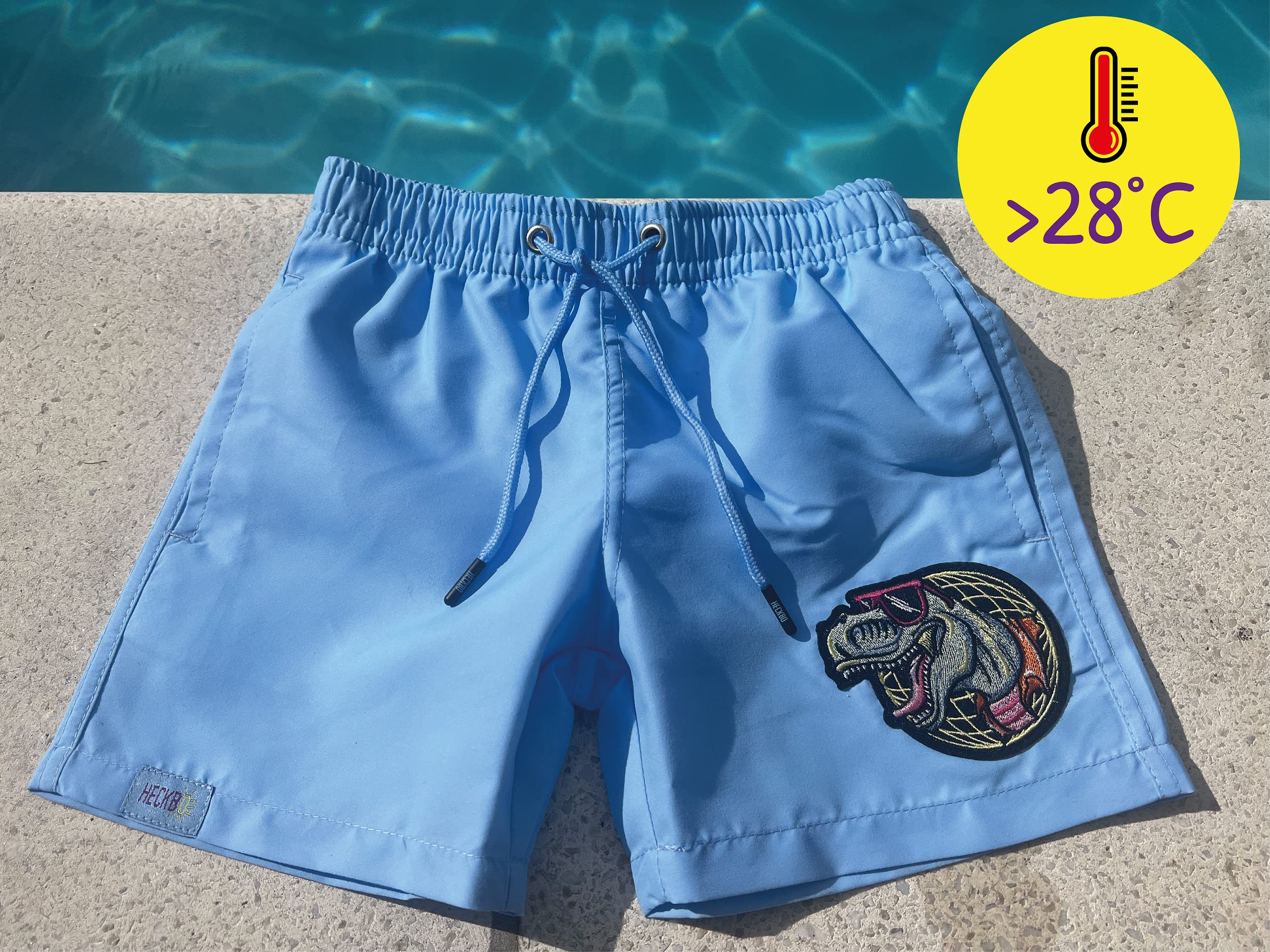 HECKBO Magic Farbwechsel Badehose für Jungen - Dinosaurier Dino - wechselt bei 30° die Farbe - Stretch Hose - hellblau Lila - Badeshorts - Shorts - 3 Verschiedene Größen - 3-7 Jahre - Kinder Jungs