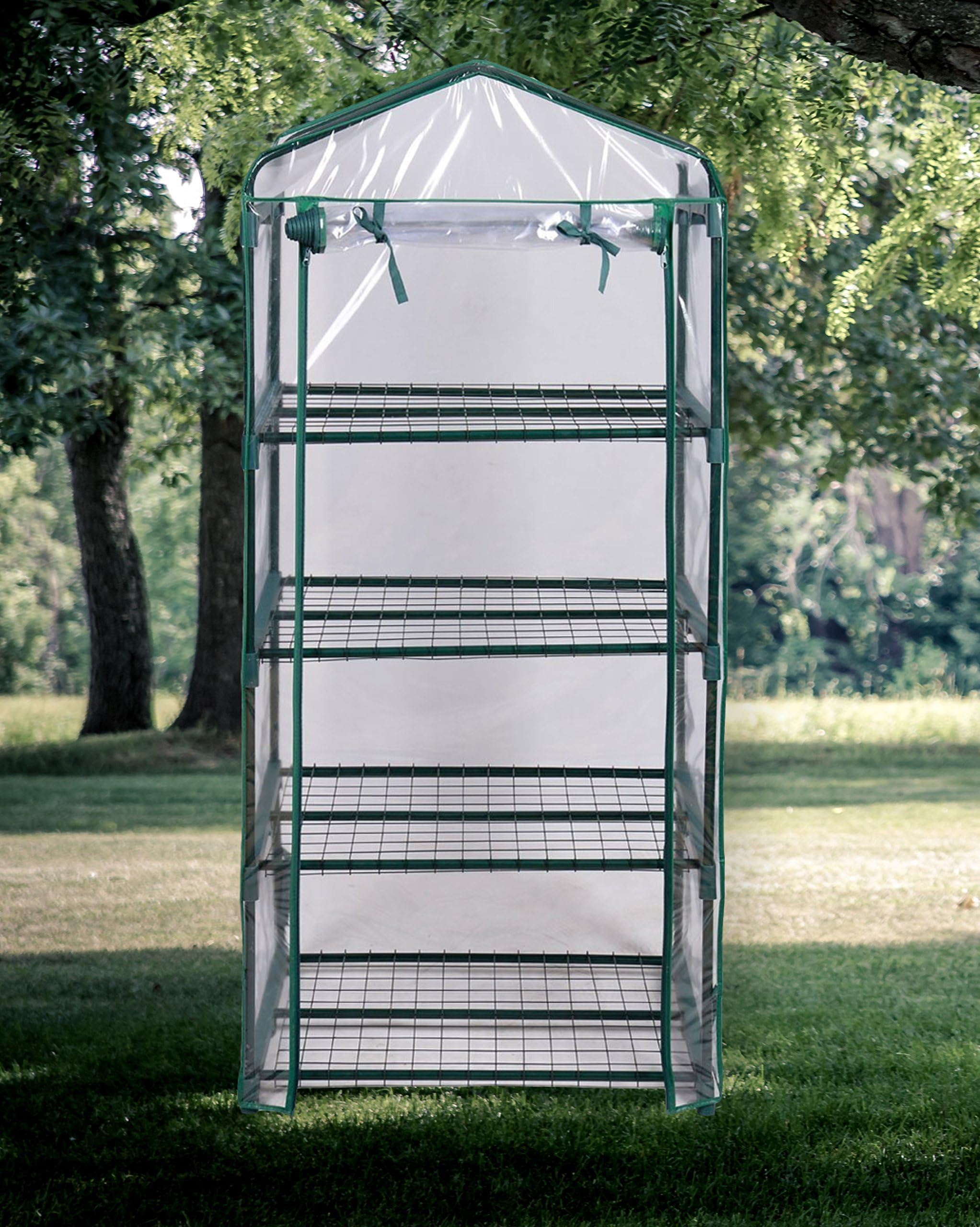 4-Tier Portable Mini Greenhouse - Green House Kit Includes Plant Labels, Guy Ropes, Stakes, Zip Ties to Secure Your Greenhouse. Dimensions 27" Length x 19" Width x 63" Height (Clear PVC Cover)