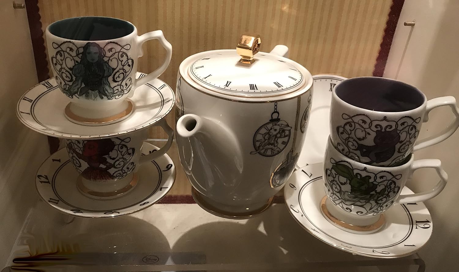 Original Tea Set from Alice in the Wonderland behind the mirrors disney
