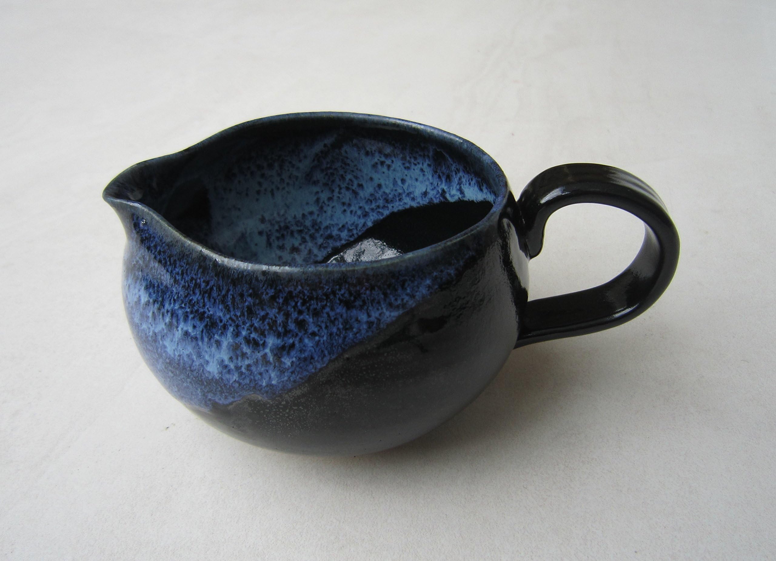 Black and blue jug; Blue and black creamer; Black and blue milk jug; Blue and black salad dressing jug; Sauce jug; Gravy jug ; Syrup jug; Jug with shiny blue and black glazes; House warming present