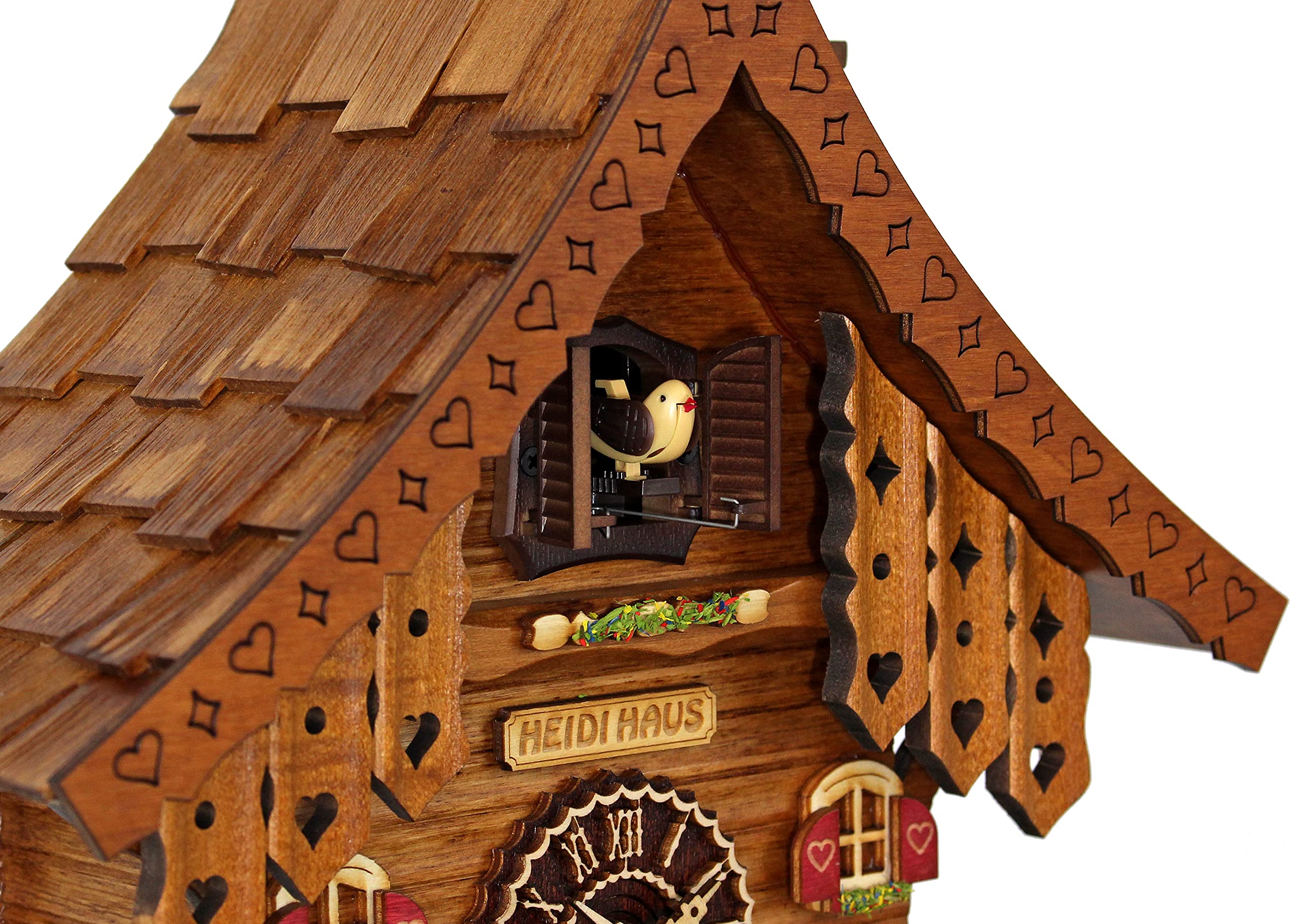 Trenkle Horloge à coucou à quartz Maison de la Forêt-Noire avec roue mobile et horloge Peddler avec musique TU 478 QM HZZG