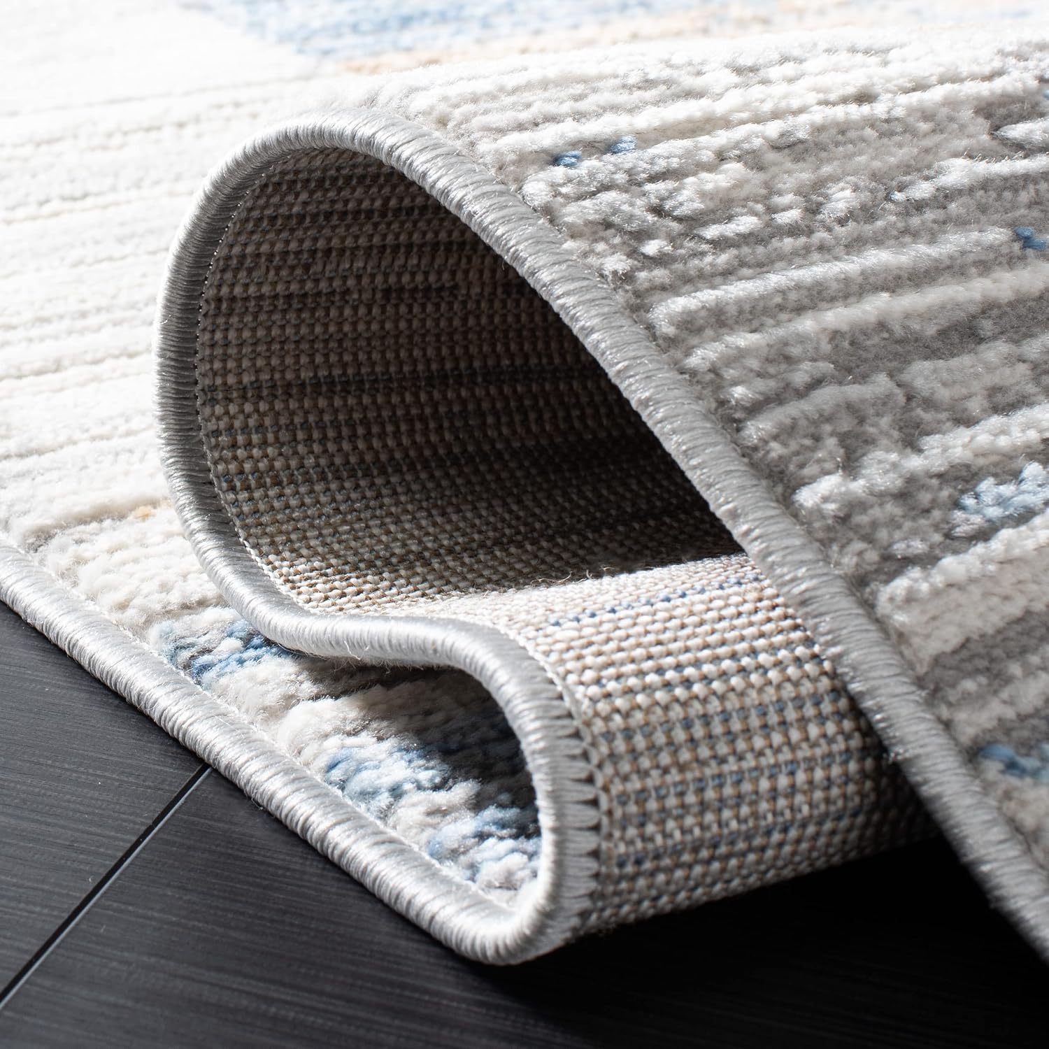 SAFAVIEH Shivan Collection Area Rug - 9' x 12', Ivory & Blue, Modern Abstract Distressed Design, Non-Shedding & Easy Care, Ideal for High Traffic Areas in Living Room, Bedroom (SHV198M)