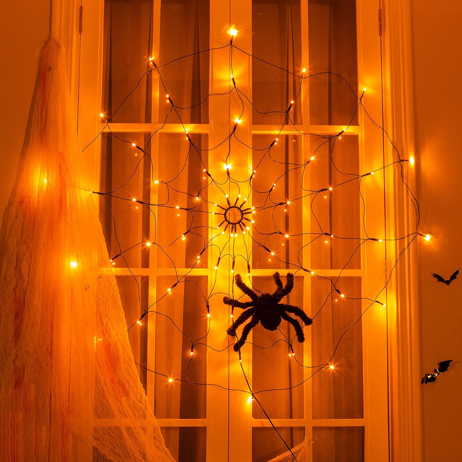 EAMBRITE LED Halloween Black Spider Web Light with 70 LED Waterproof Orange Net Lights and 1 Black Spider for House Yard Garden Indoor and Outdoor Scary Halloween Theme