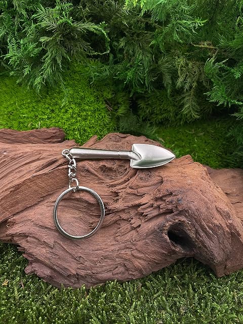 Foto 3 de 5 de Onwomania Llavero pala pala metal plateado colgante encanto