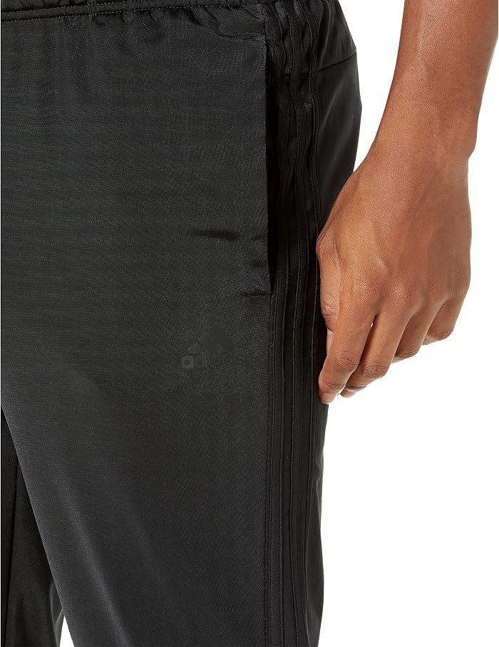 Мужские брюки adidas Essentials 3-Stripes Tricot Jogger, цвет: Чёрный — фото 3