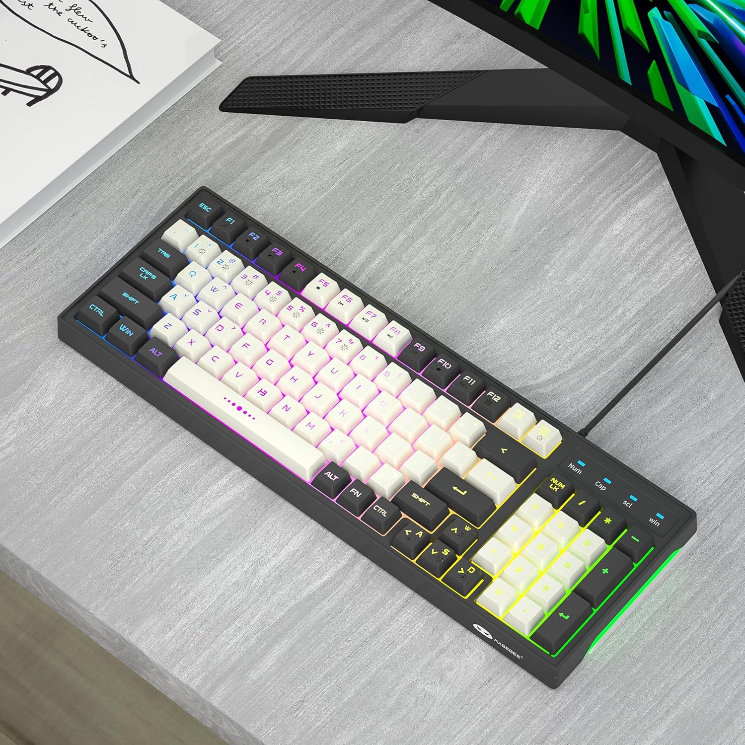 MageGee GT860 keyboard set up on a desk next to a monitor