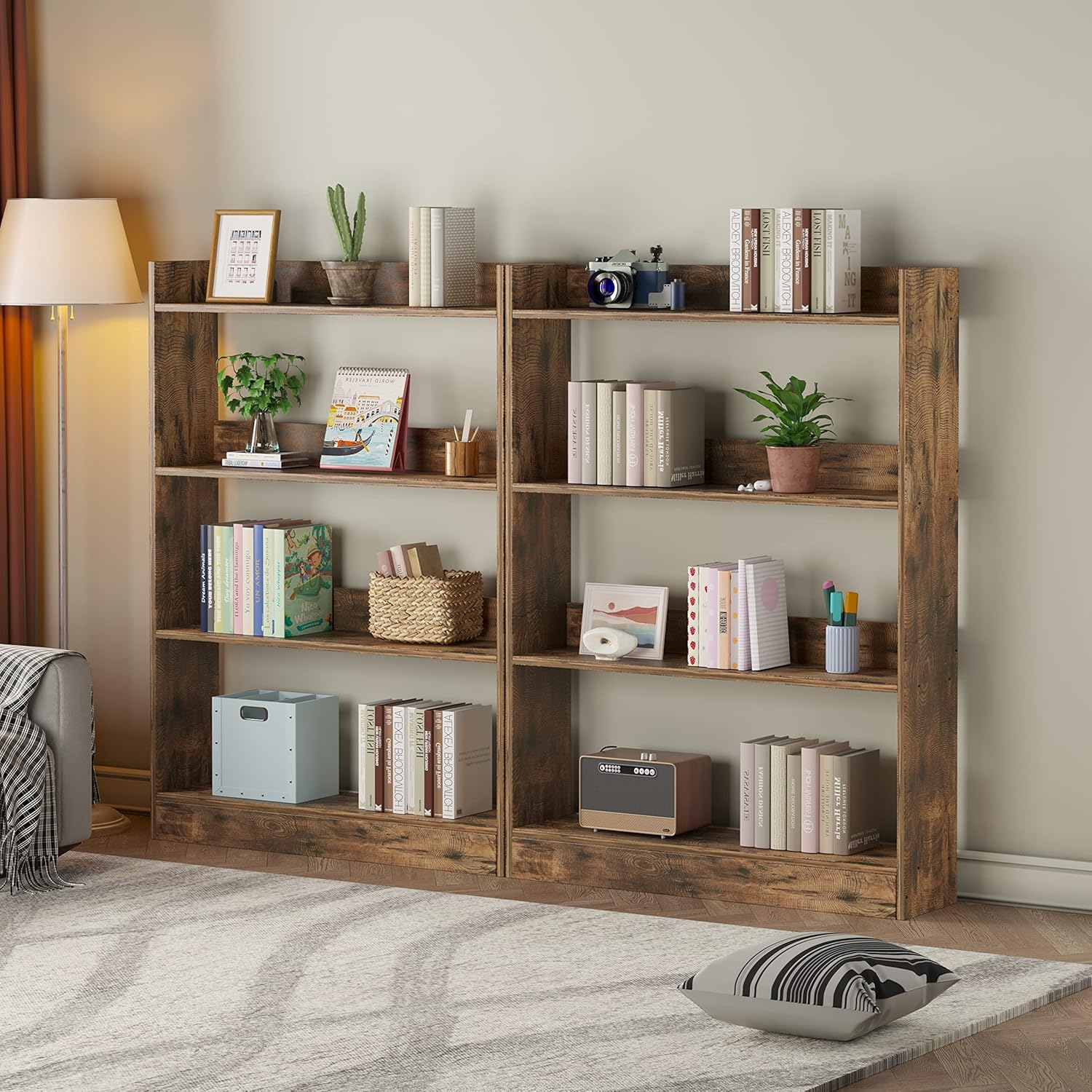 Two Flrrtenv 4-Tier Bookshelves placed side-by-side in a room, showcasing their modular potential.