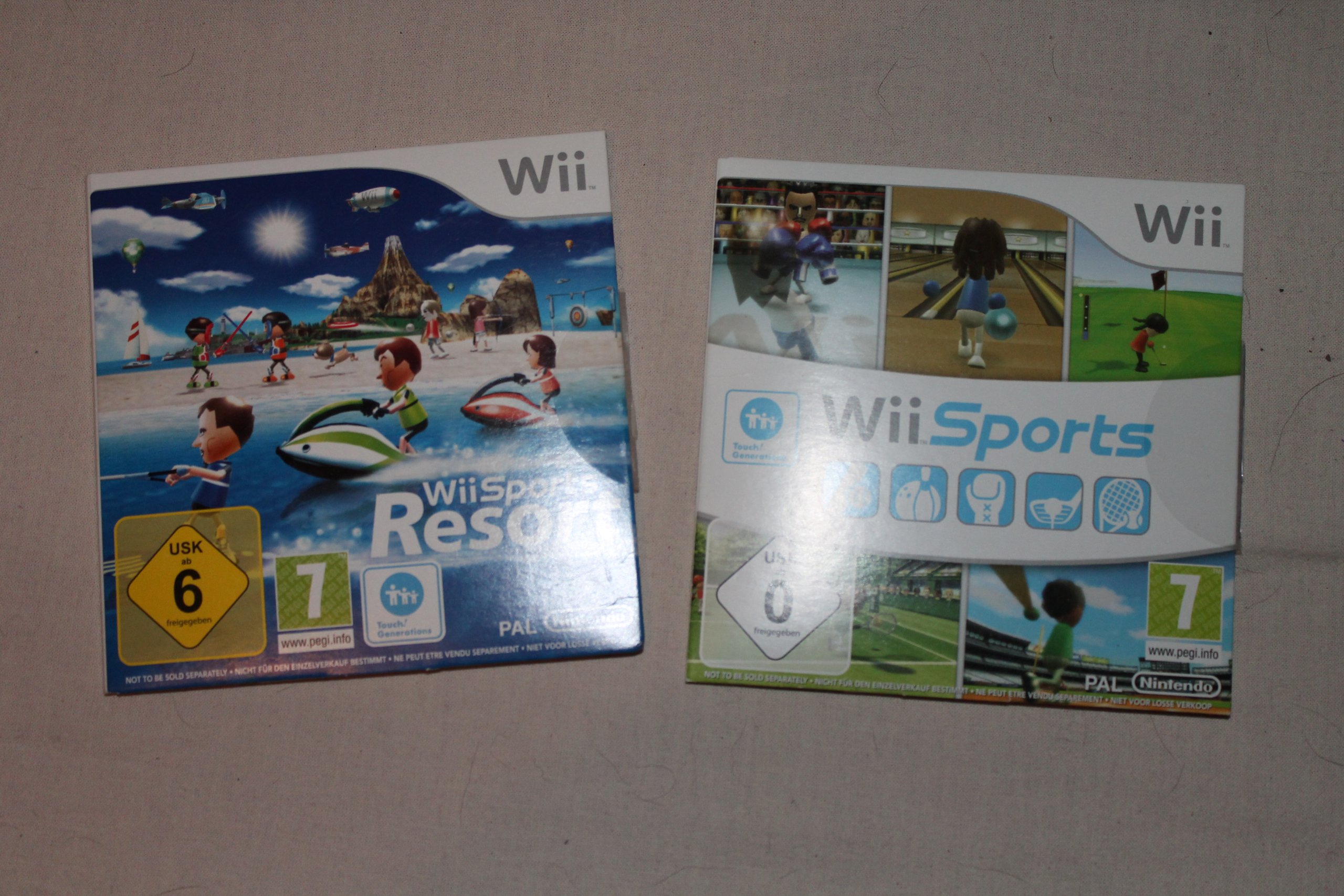 Console Wii noire + accessoires (inclus Wii Sports + Wii Sports Resort)