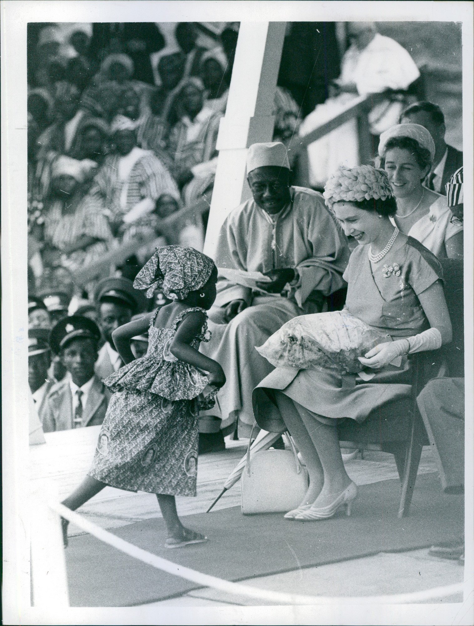 Vintage photo of Royel Tour of Sierra Leone Continuing their tour of Sierra Leone, The Queen and Prince Phillip attended the Kenema Royel Show.Date: 1. 12. 1961