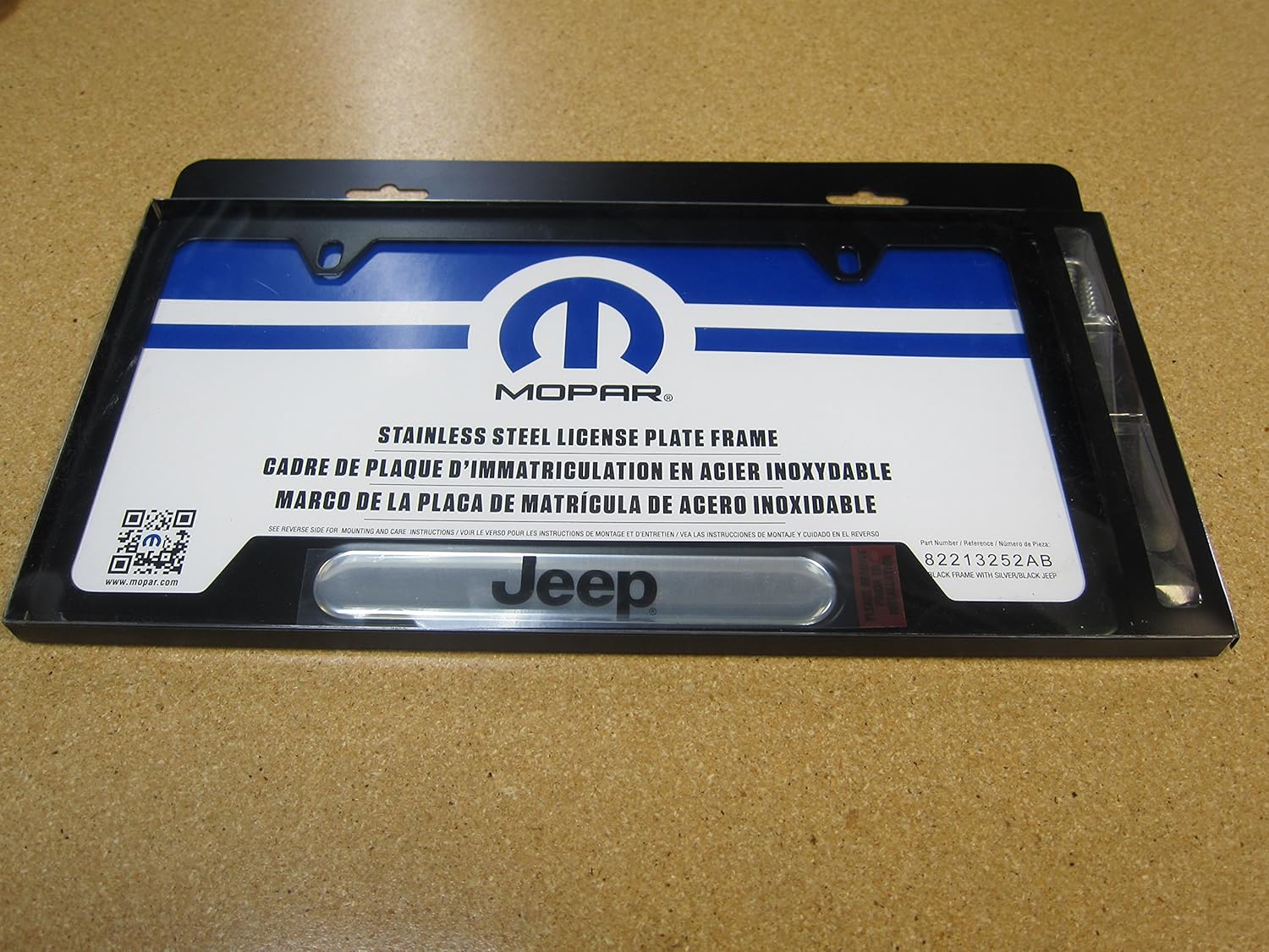 Mopar 82213252AB License Plate Frame License Plate Frame, Satin Black, two top holes, Jeep brand logo. Fits all Jeep vehicles