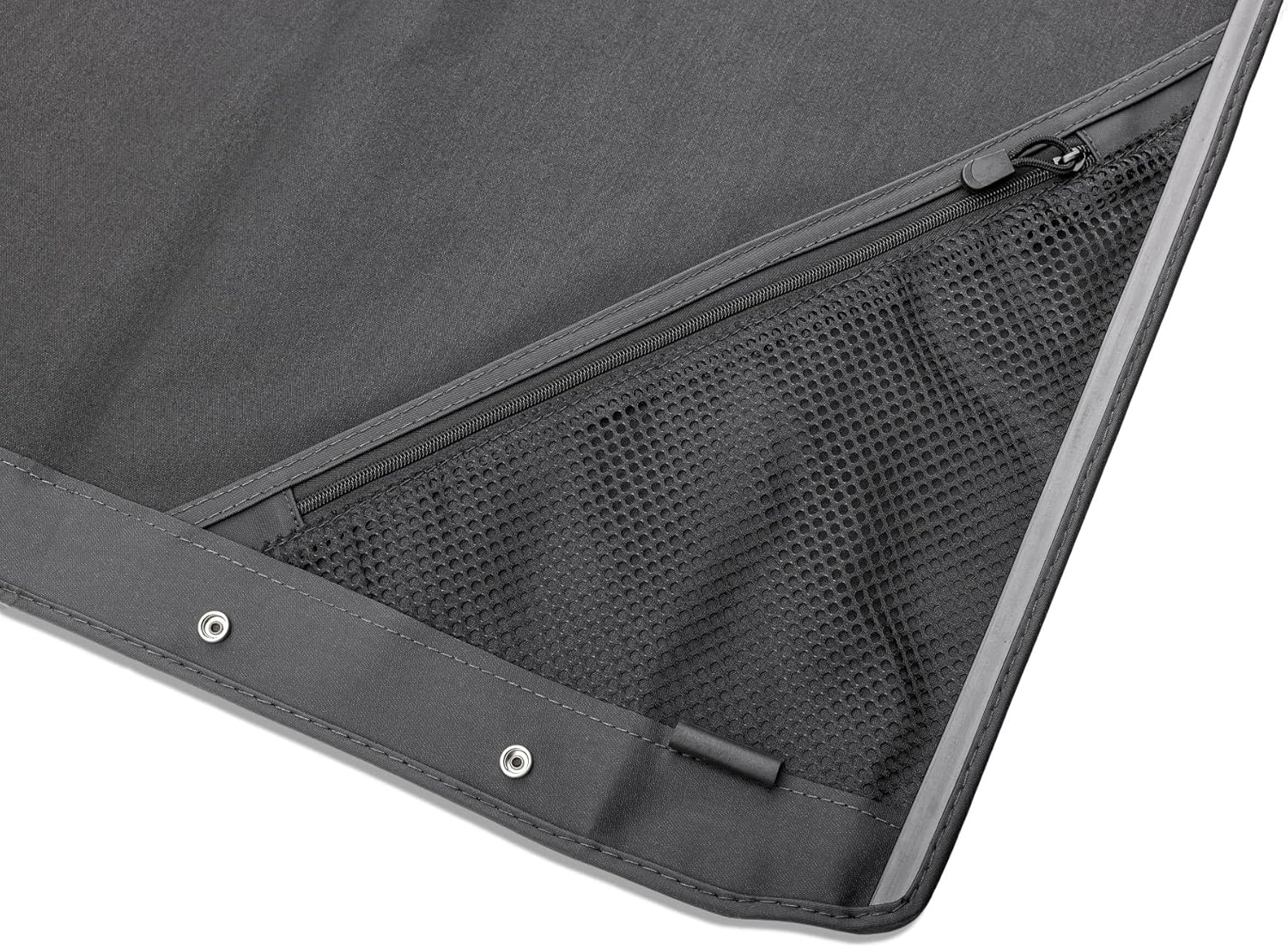 Close-up of a zippered storage compartment on the soft top fabric