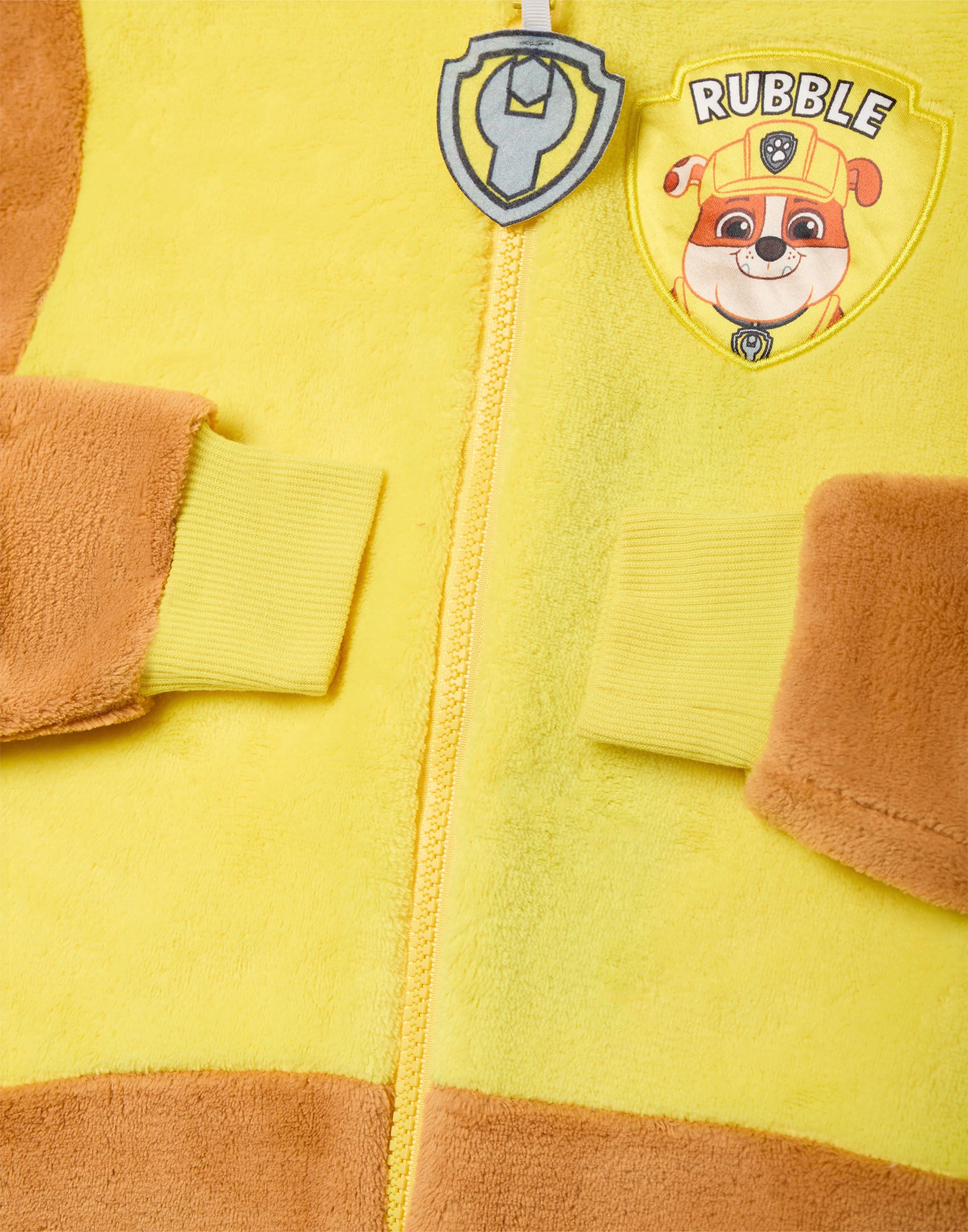 Paw Patrol Rubble Grenouillère pour Garçons & Filles | Pyjama Tout-en-Un pour Enfants en Marron & Jaune | Combinaison de Nuit Unisexe avec Capuche Brodée et Oreilles 3D