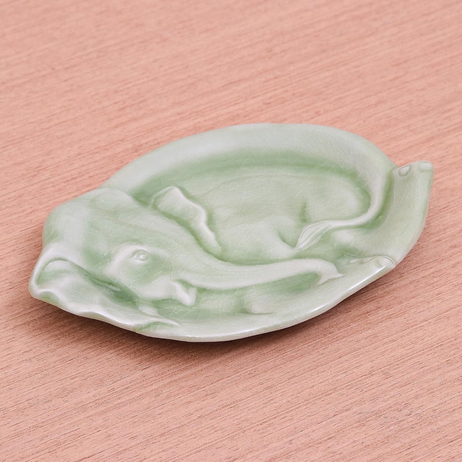 NOVICA Artisan Handmade Celadon Ceramic Plate Elephant Themed Green Thailand Tableware Dinnerware Plates Animal [1in H x 7.25in W x 5.25in D] ' Elephant at Rest in Green'
