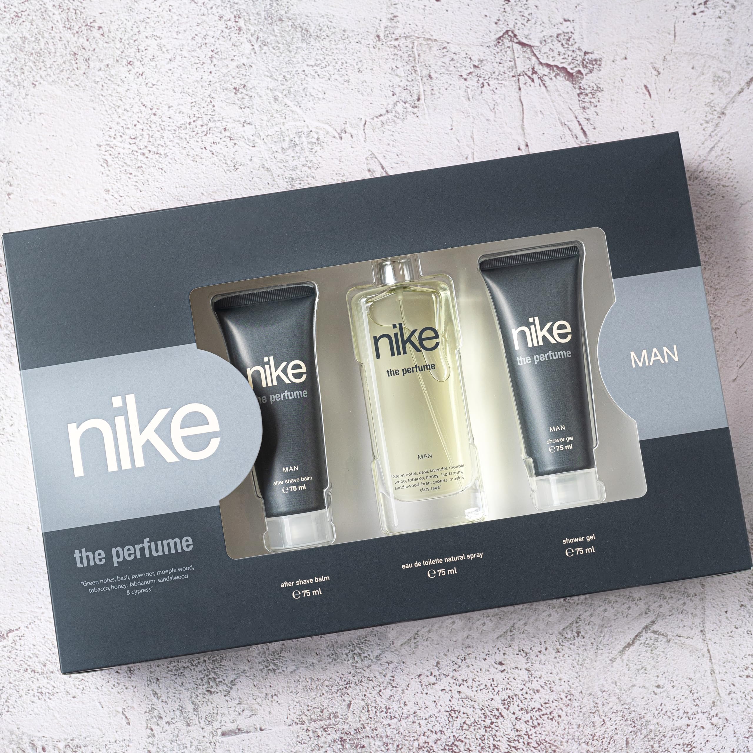 NIKE - The Perfume Man Colonia 75 ml + After Shave + Gel de Baño, Estuche de Regalo Hombre, Eau de Toilette Natural y Masculino, Aromática Amaderada, Fragancia Intensa, Juvenil y Duradera
