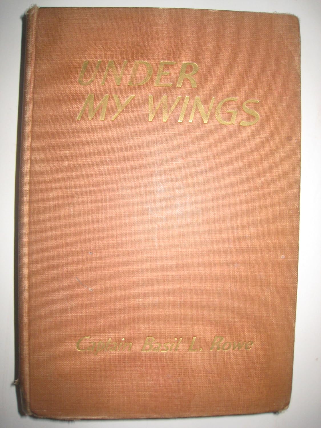 Under My Wings: Rowe, Basil L.: Amazon.com: Books