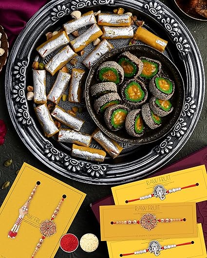 Rakhi for brother and bhabhi with sweets Kaju Kesar Rolls Anjeer Chakkar 500 Grams by The House Of Treats? Rakhi for Brother Combo of 5 Rakhi gift for brother with sweets Rakhi Combo Pack