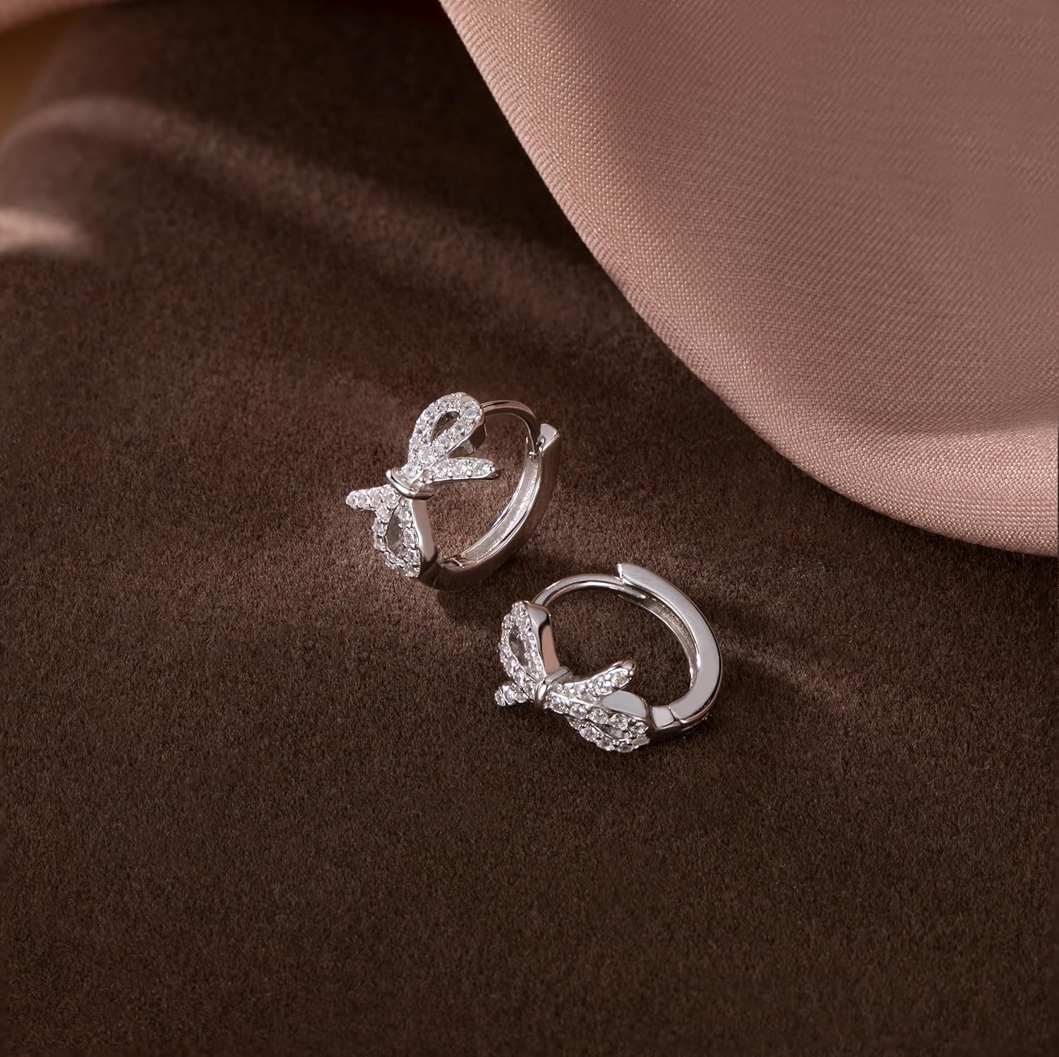 SLUYNZ Sterling Silver CZ Bow Huggie Hoop earrings for Women Teens Small Bowknot Hoop Earrings Huggie