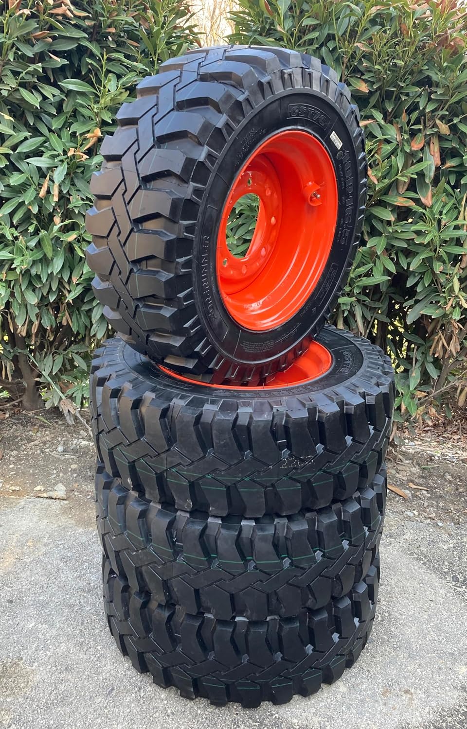 Set of 4-Heavy Duty 10R16.5 Forerunner CST76 All-Steel Radial Skid Steer Tires on Wheels/Rims (8 lug) for Bobcat & more -12PLY -10X16.5