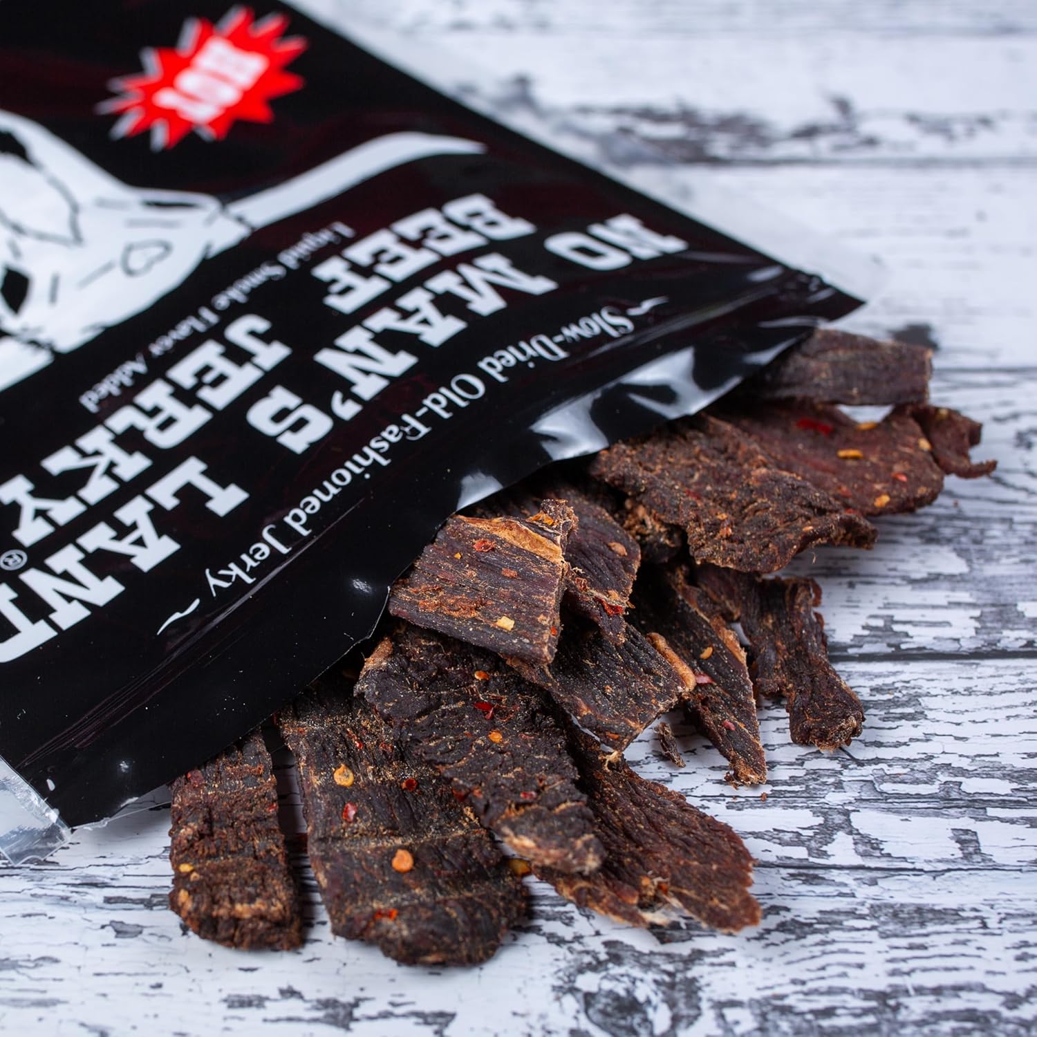 No Mans Land Premium Beef Jerky | 17G High Protein, Low Carb, Low Calorie Beef Snack | Slow-Dried, Smoked & Seasoned Jerky Strips | HOT 8.5oz Bag