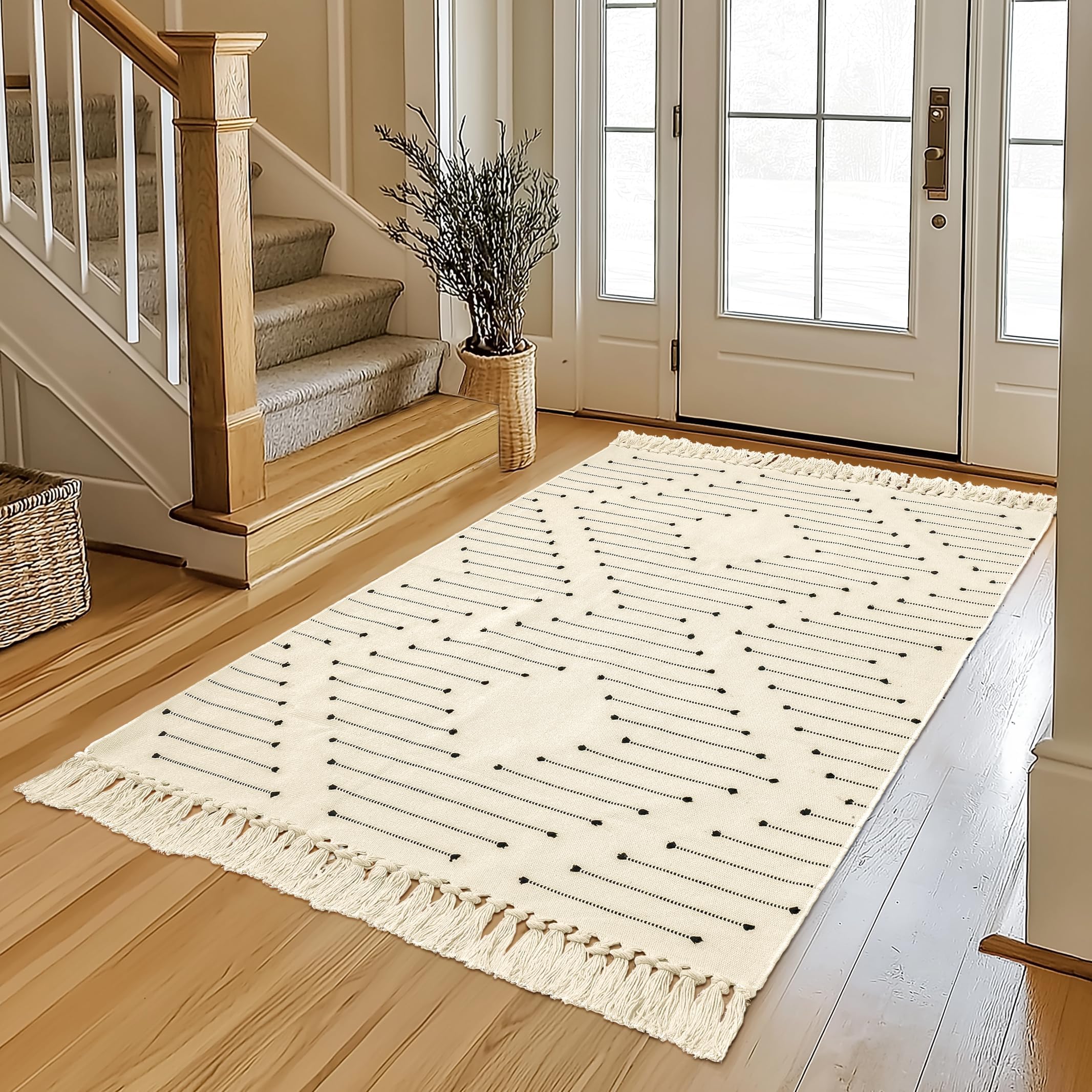 Tapis tissé beige avec pampilles Tritard de dim. 0,9x1,5m pour salon élégant