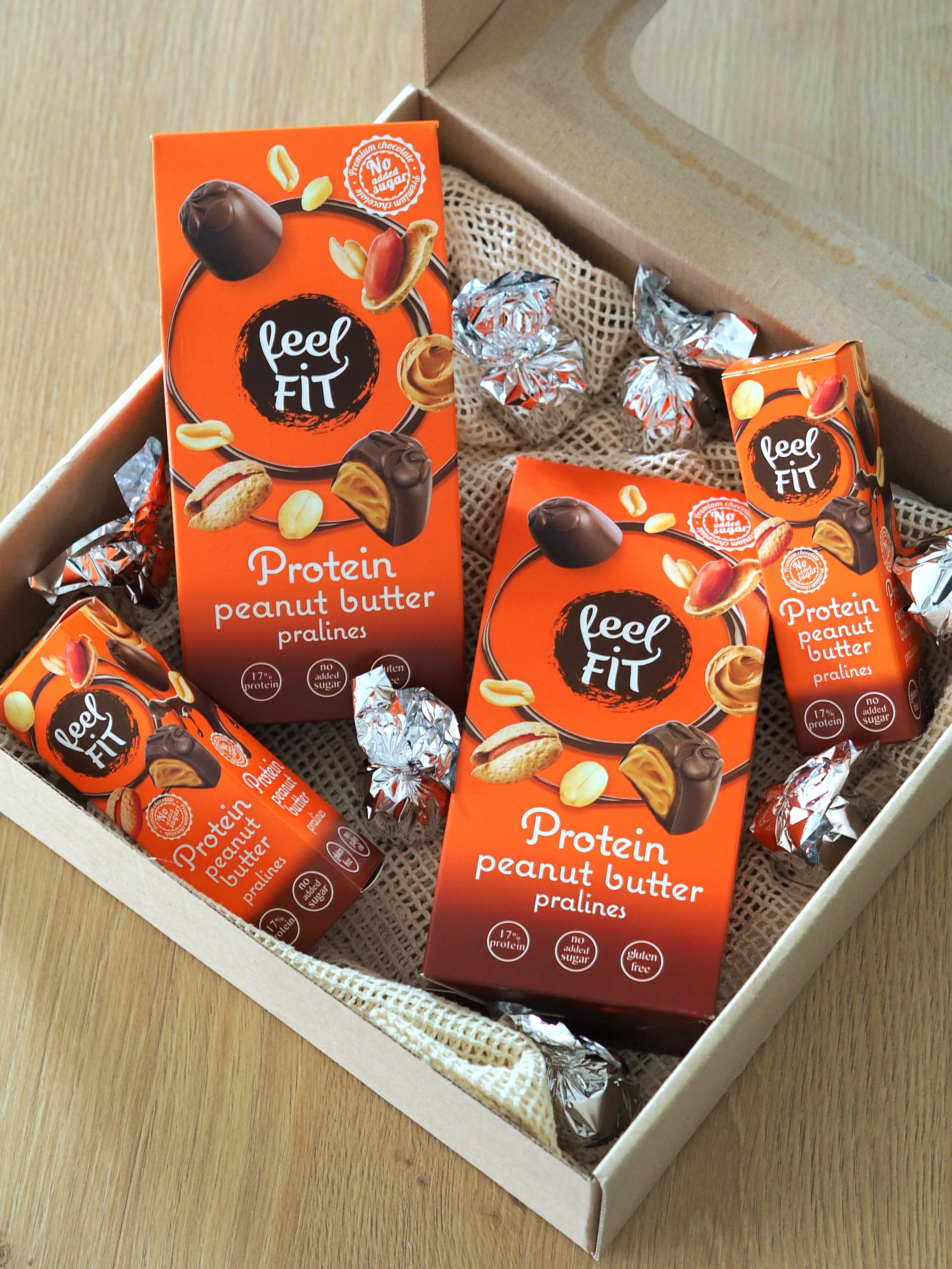 Feel FIT Protein Beurre de cacahuète Pralinés au chocolat au lait belge. Sans sucre, sans gluten, protein snack (12 x 33 g)