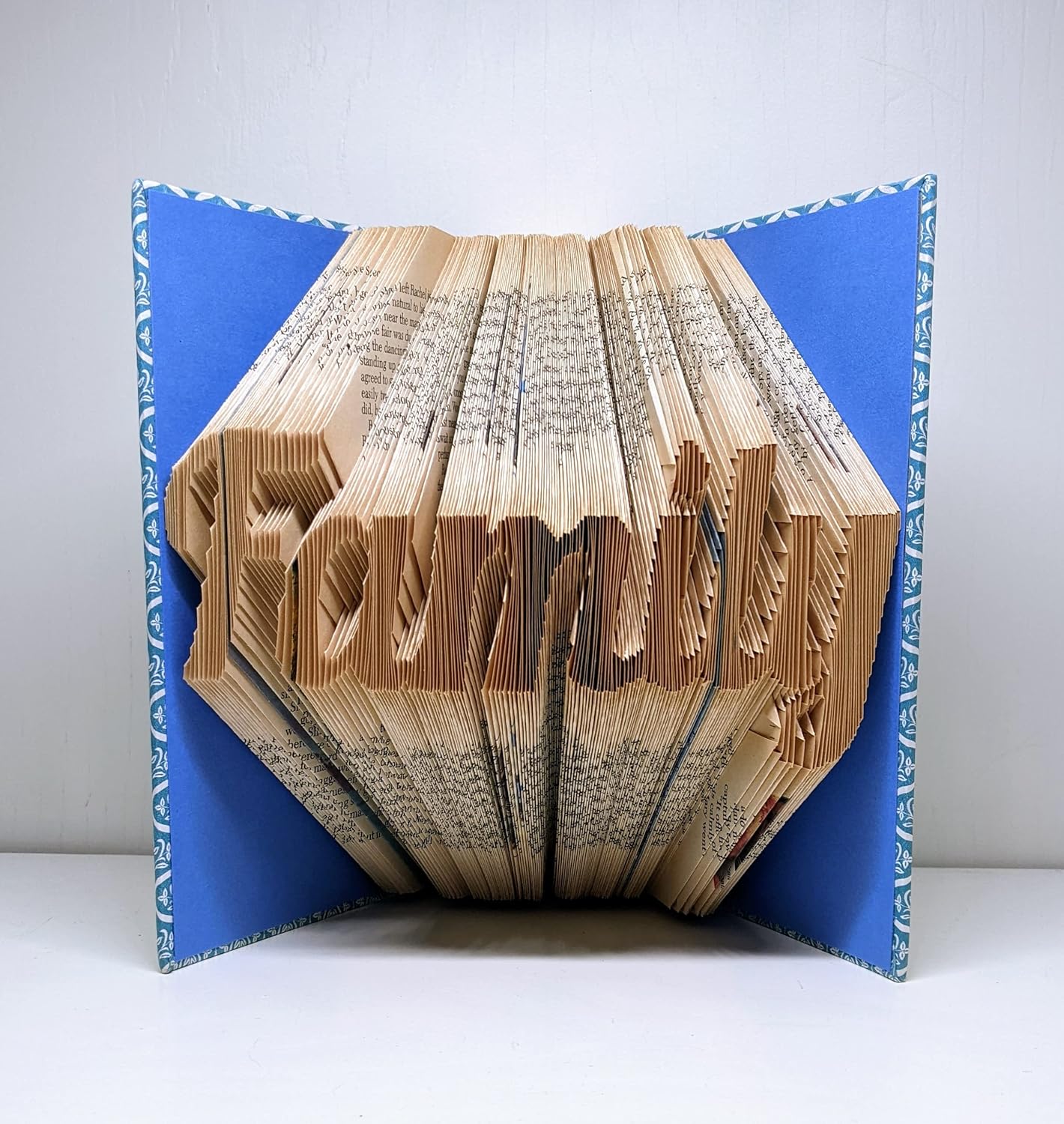 Family book sculpture. Cursive font. Custom handmade folded book sculpture. Perfect for any occasion!