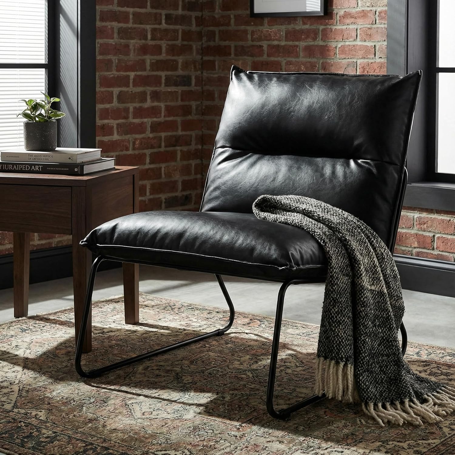 Cortesi Home Havana Accent Chair in Distressed Black Faux Leather and Metal Legs