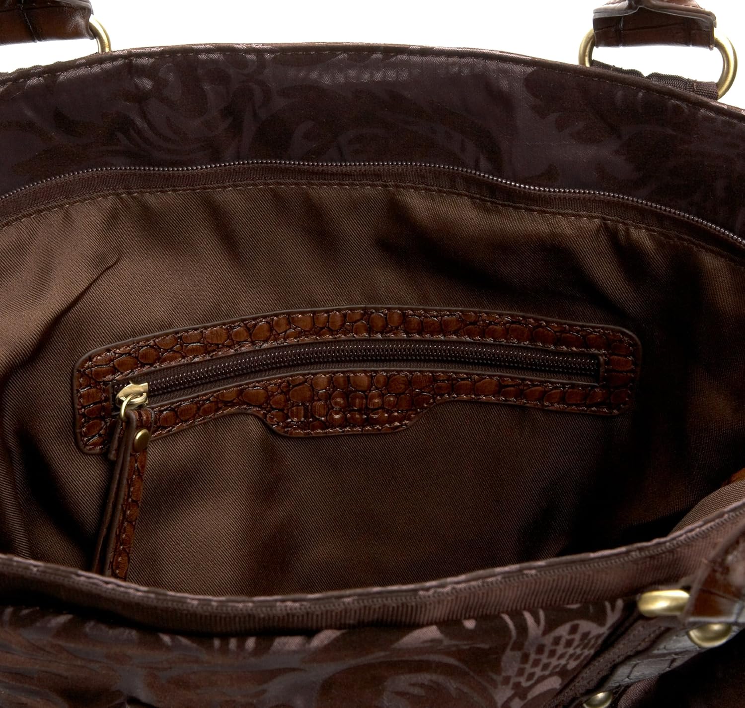 Enterijer view of the IMOSHION Vina Tote showing the polyester lining and an internal zippered pocket.