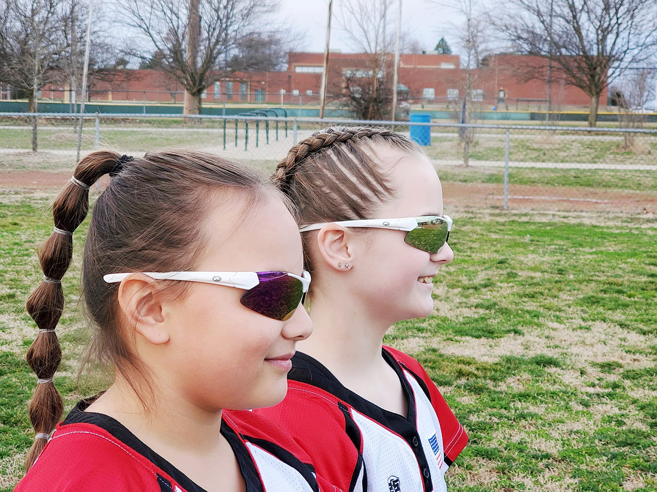 RAWLINGS Młodzieżowe sportowe okulary baseballowe 100% UV Poly soczewki lekkie stylowe soczewki ochronne, składane odporne na zarysowania, biały/różowy