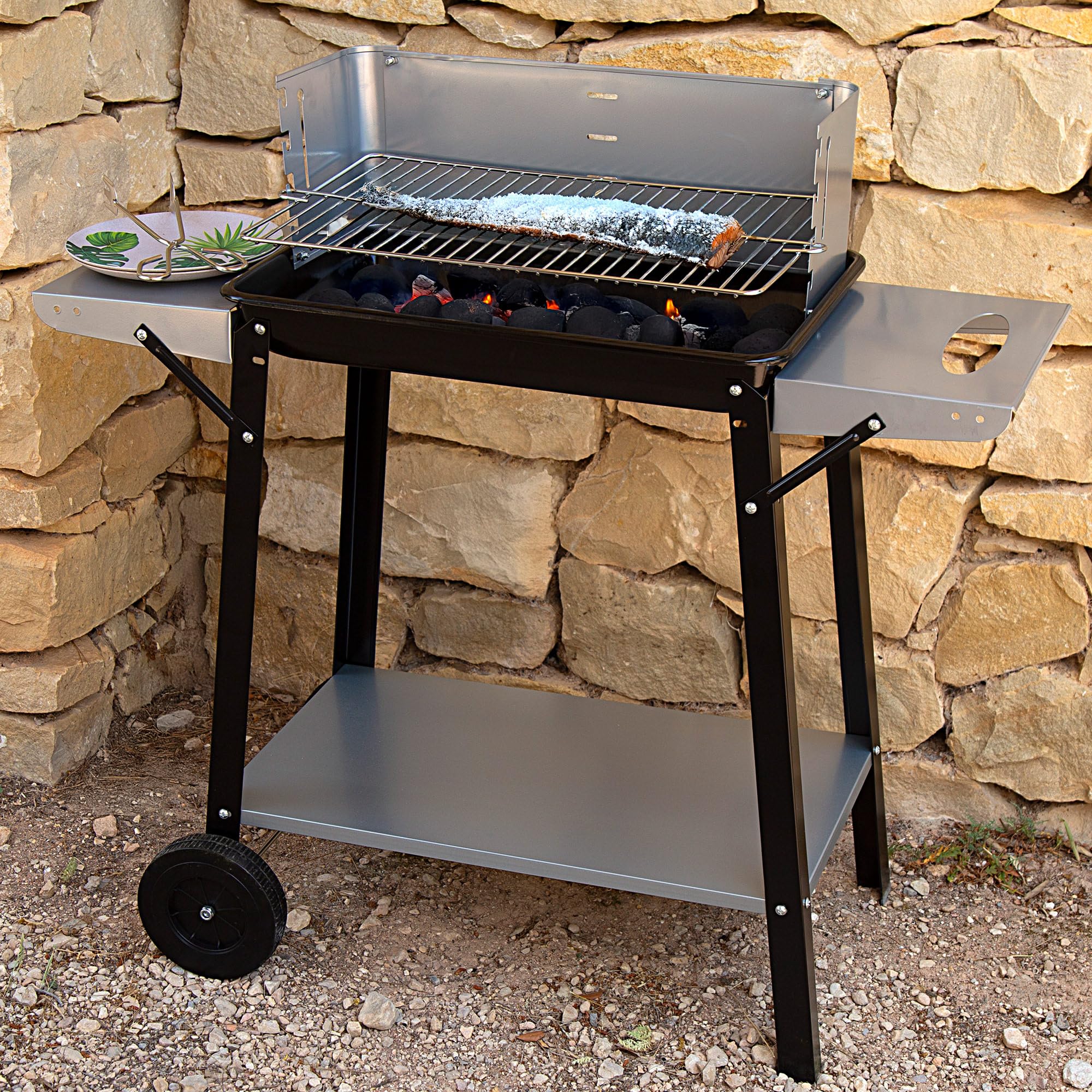 Aktive 52973 - Barbacoa carbón y leña 90x32x85 cm con control de temperatura y dos mangos extraíbles, 4 alturas regulables, 2 ruedas y asa de transporte, Fácil y rápida de montar