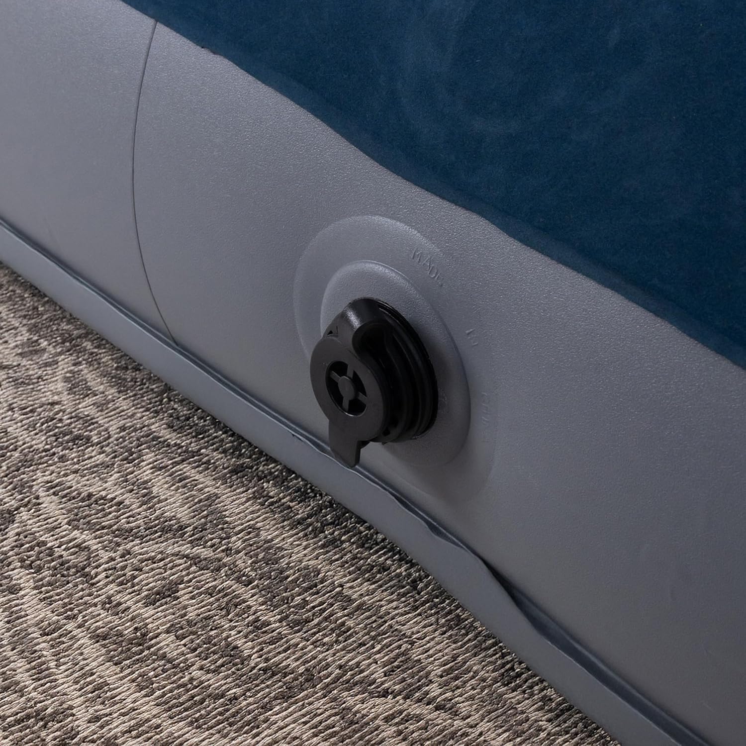 Close-up of the 2-in-1 inflation/deflation valve on the air bed