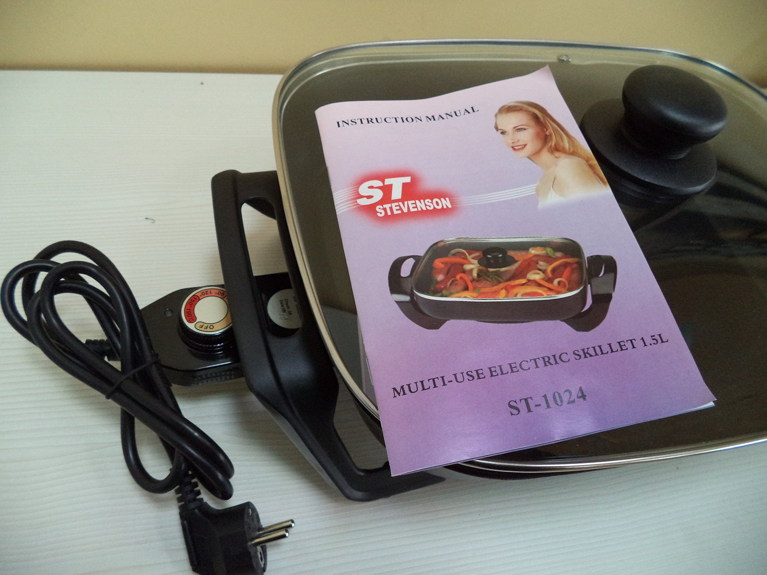 WOK eléctrico con regulador de temperatura, antiadherente, con tapa de cristal templado transparente. Medida del recipiente: 37x30x7 cms.