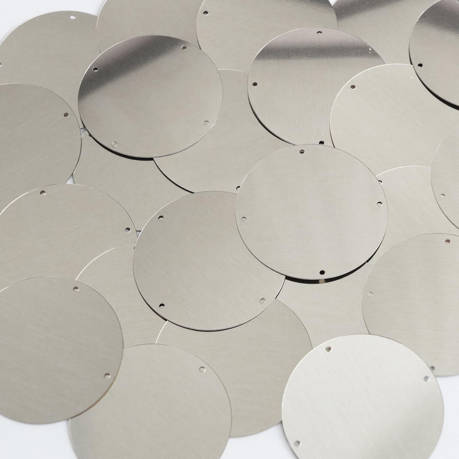 Sequin Round 40mm 4 Hole Silver Metallic. Made in USA