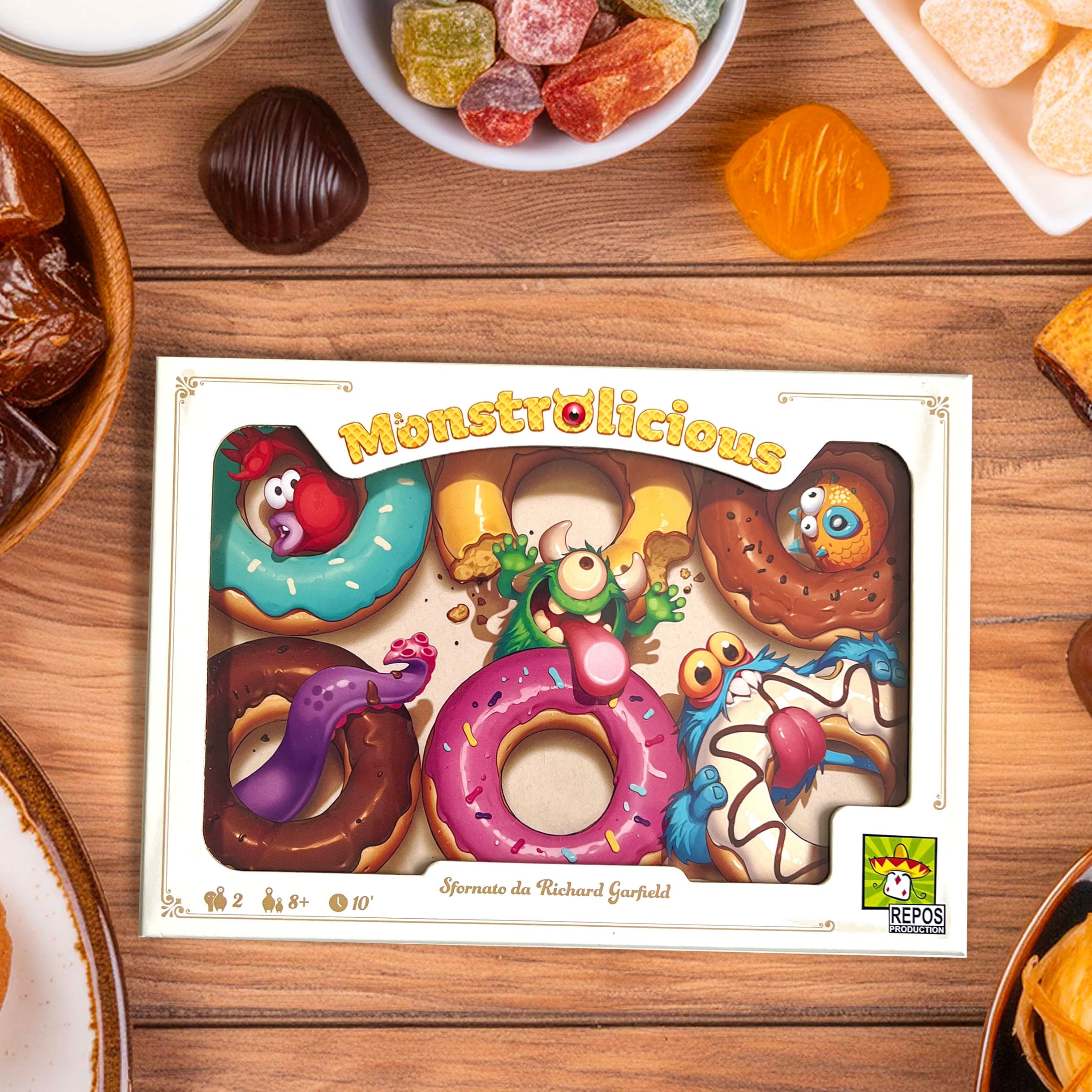 Monstrolicious - Gioco di strategia per famiglie con mostri e dessert eccentrici, mini-giochi e sorprese, età 10+, 2 giocatori, 10 minuti di gioco, realizzato da Repos Production