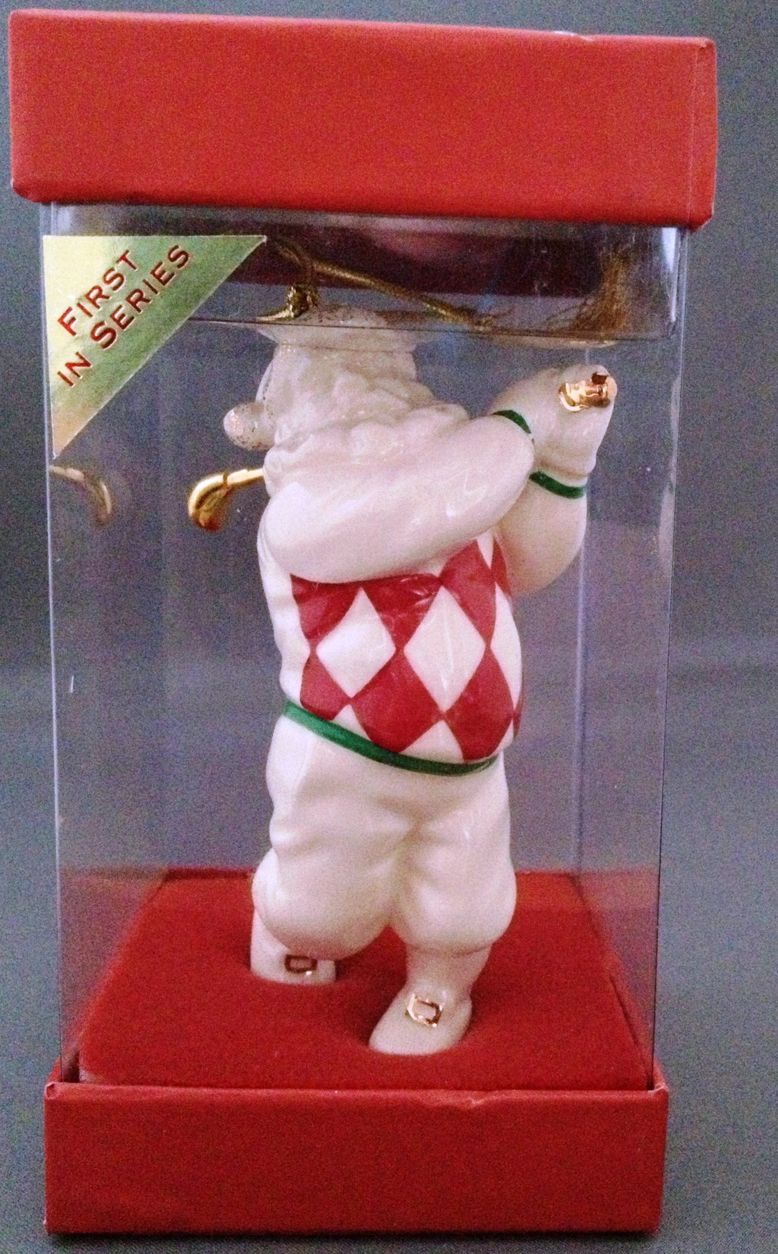 Père Noël au golf figurine festive pour décorer votre salon en hiver