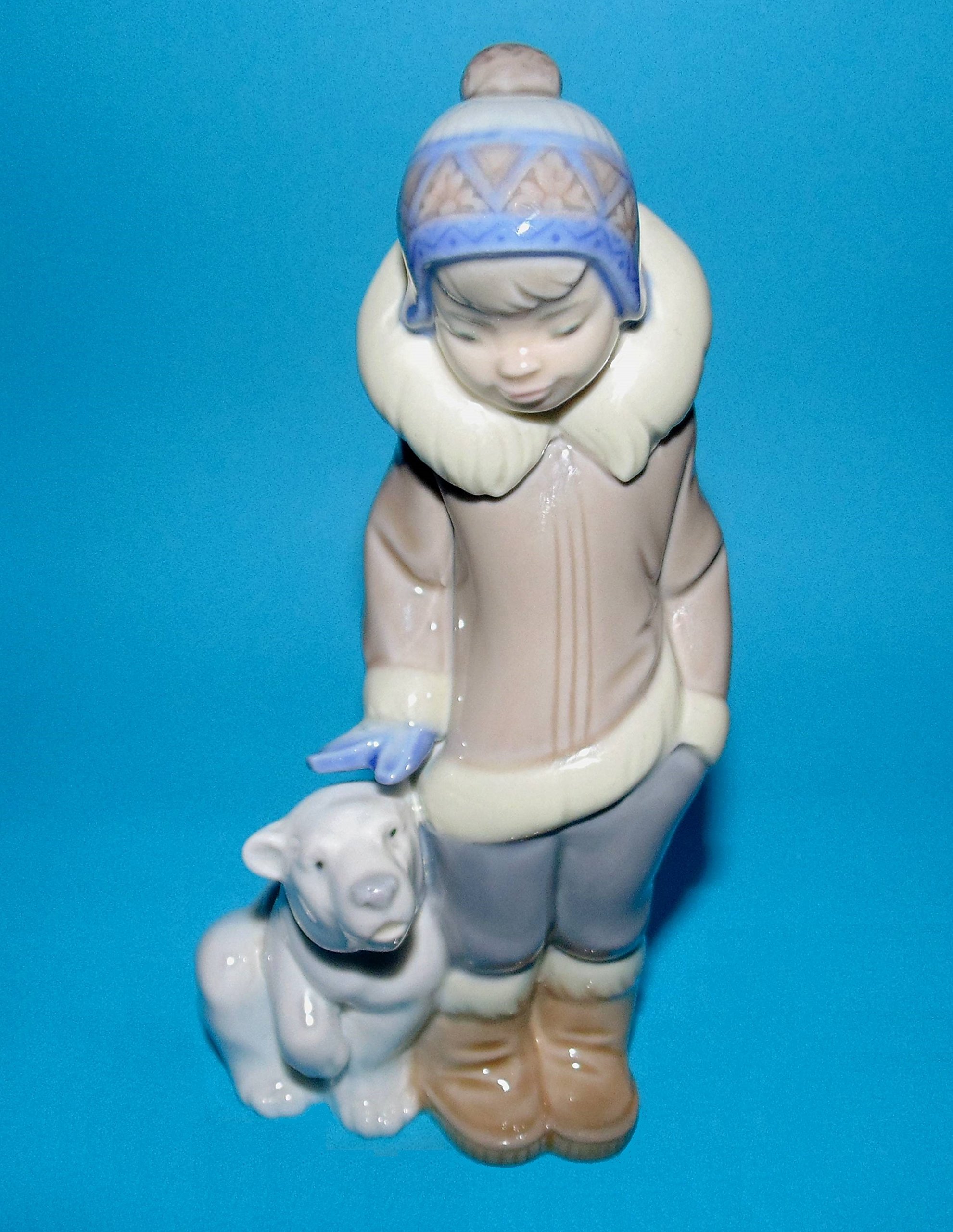 Amazon.com: Lladro Eskimo Boy with Pet Porcelain Figurine : Home