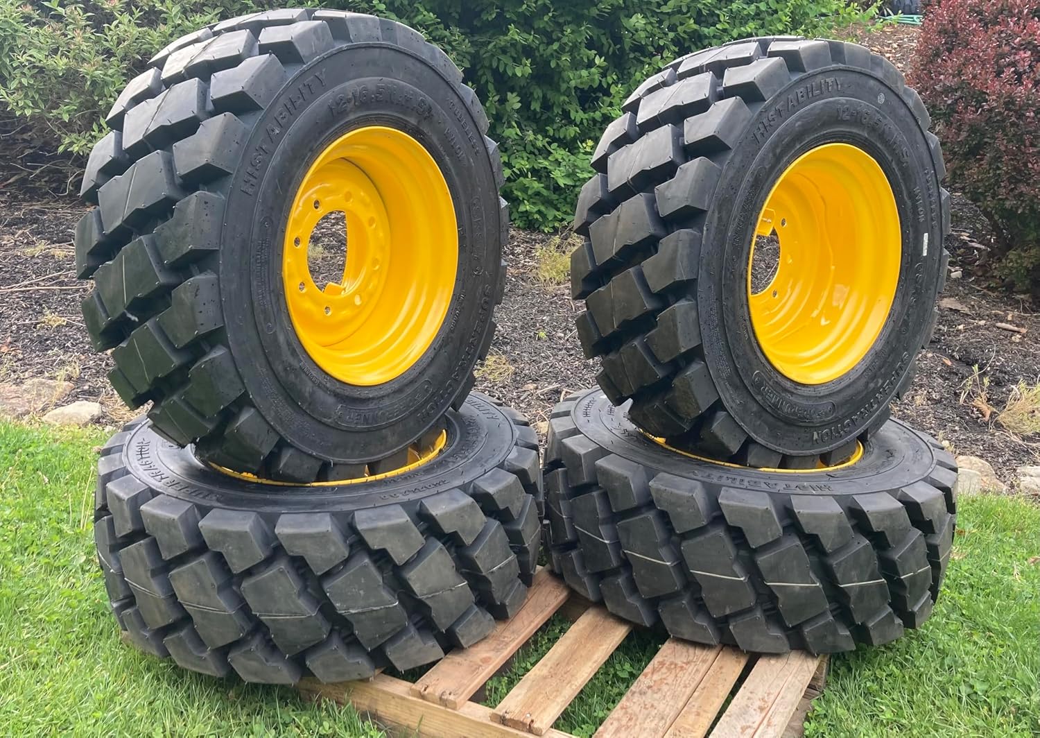 Set of 4-Heavy Duty FOAM FILLED (NO FLAT) 12-16.5 Forerunner SKS-7 Skid Steer Tires on Wheels/Rims (8 lug) for New Holland L175 & more -14PLY-12X16.5 -Heavy duty non-directional tread pattern