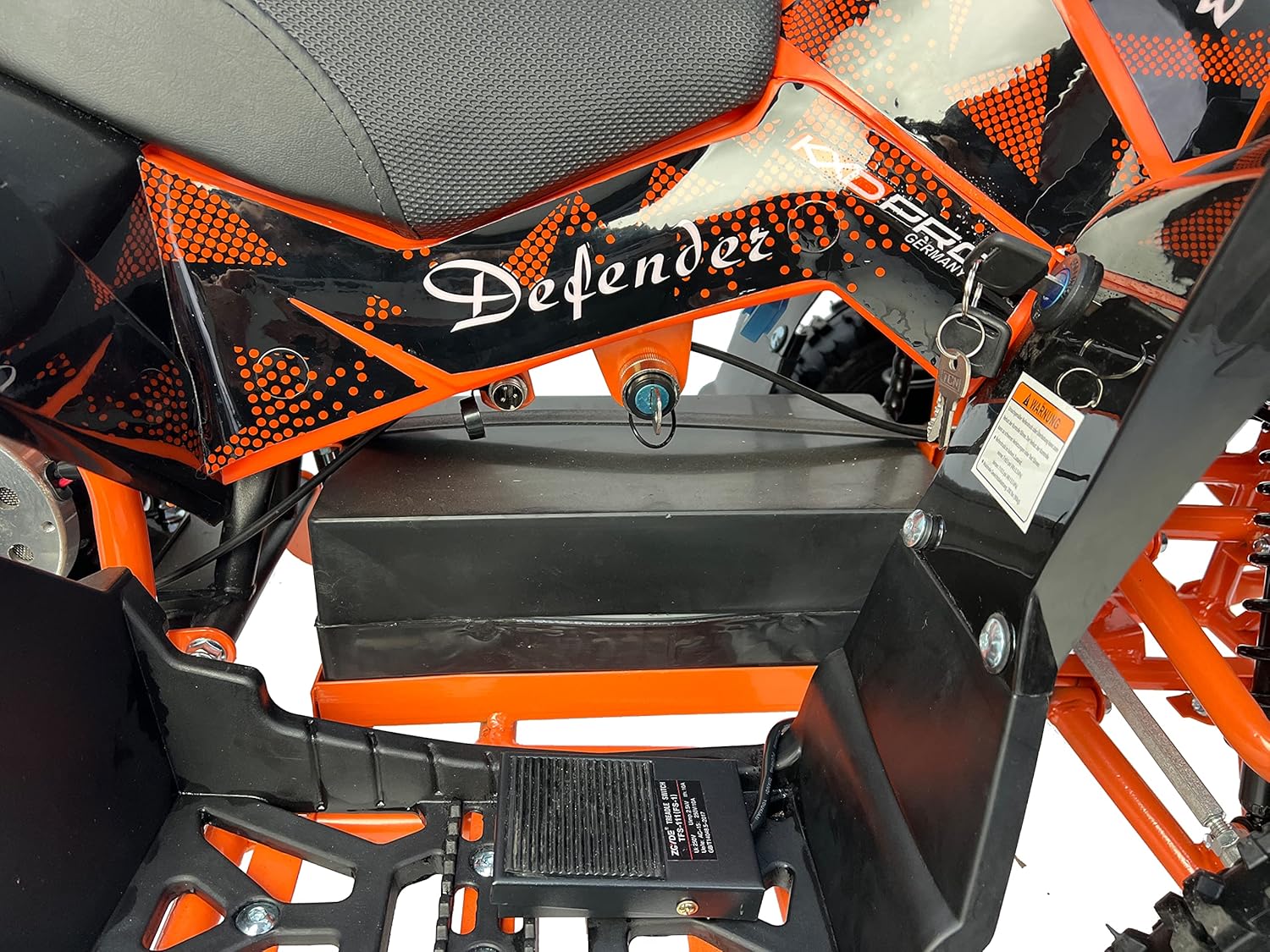 Close-up of the battery and engine area on the KXD M3 Mini ATV