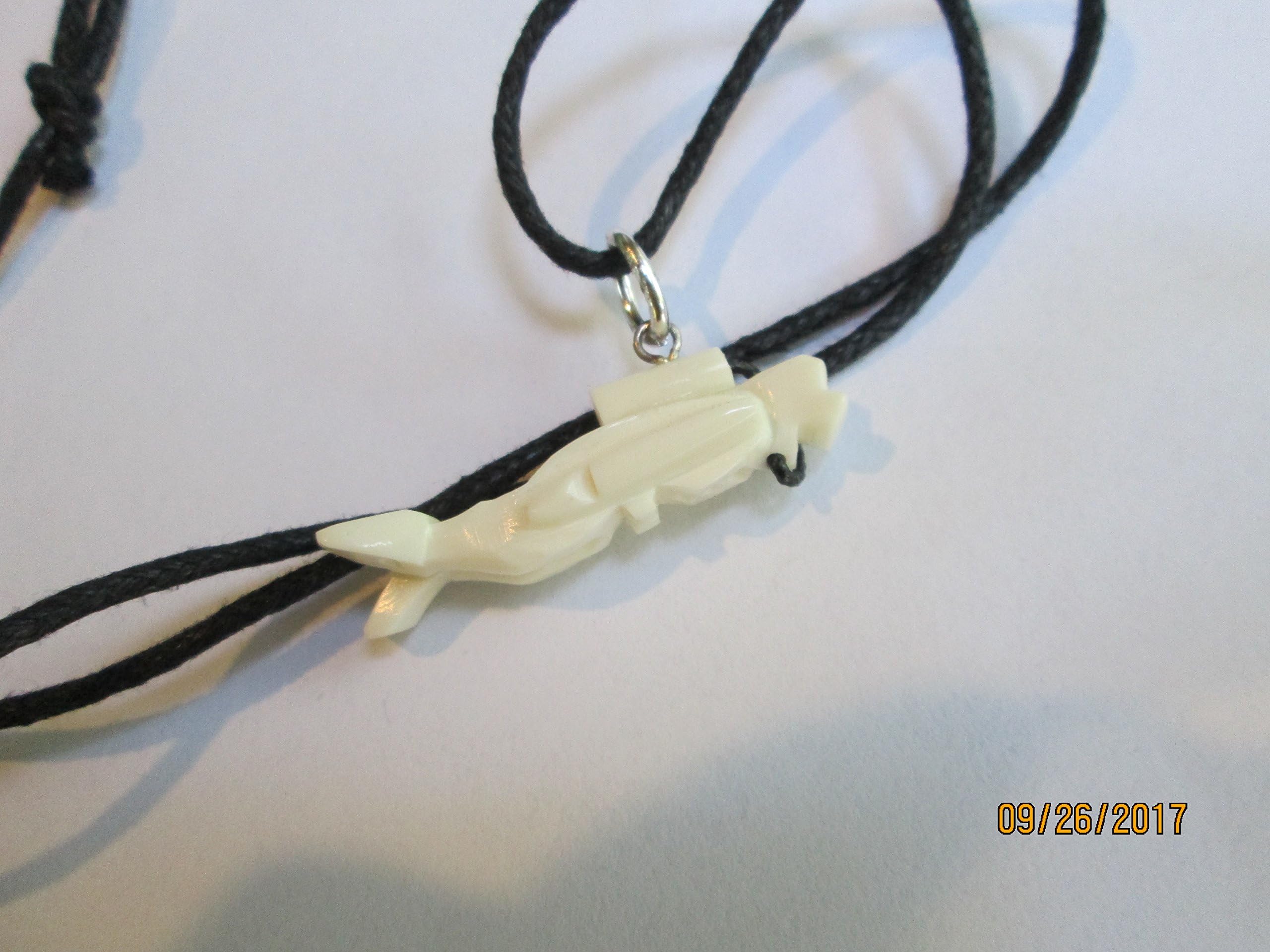 hand carved bone scuba diver necklace pendant charm on a cord