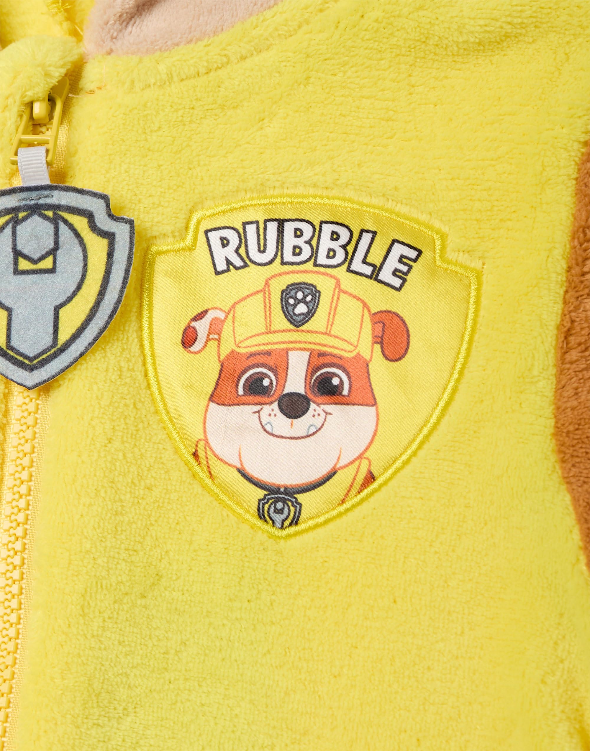 Paw Patrol Rubble Grenouillère pour Garçons & Filles | Pyjama Tout-en-Un pour Enfants en Marron & Jaune | Combinaison de Nuit Unisexe avec Capuche Brodée et Oreilles 3D
