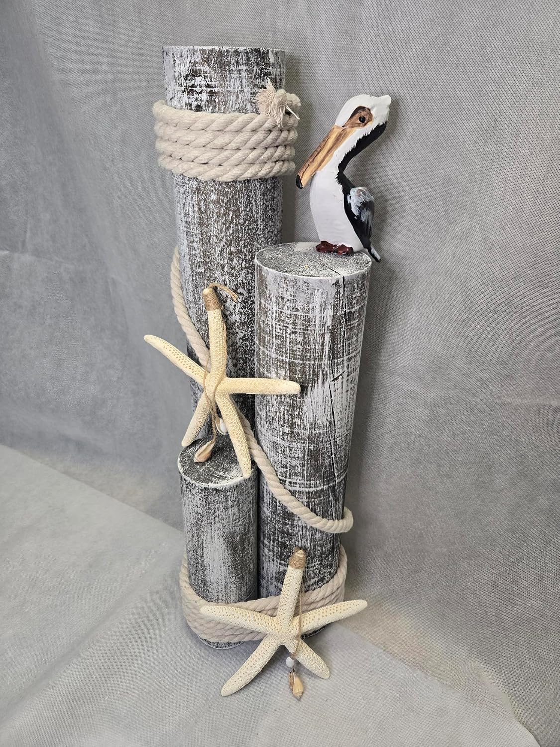Pelican on Wood Pilings Nautical Statue with Hanging Starfish – Coastal Decor for Porch, Garden, or Poolside - Marine Bird Sculpture - Nautical Décor
