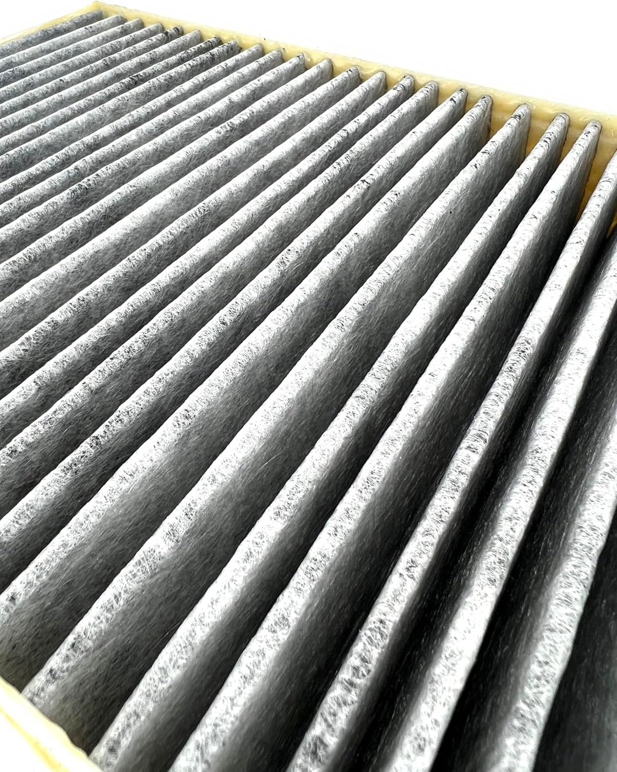 Close-up of the pleated activated carbon filter material