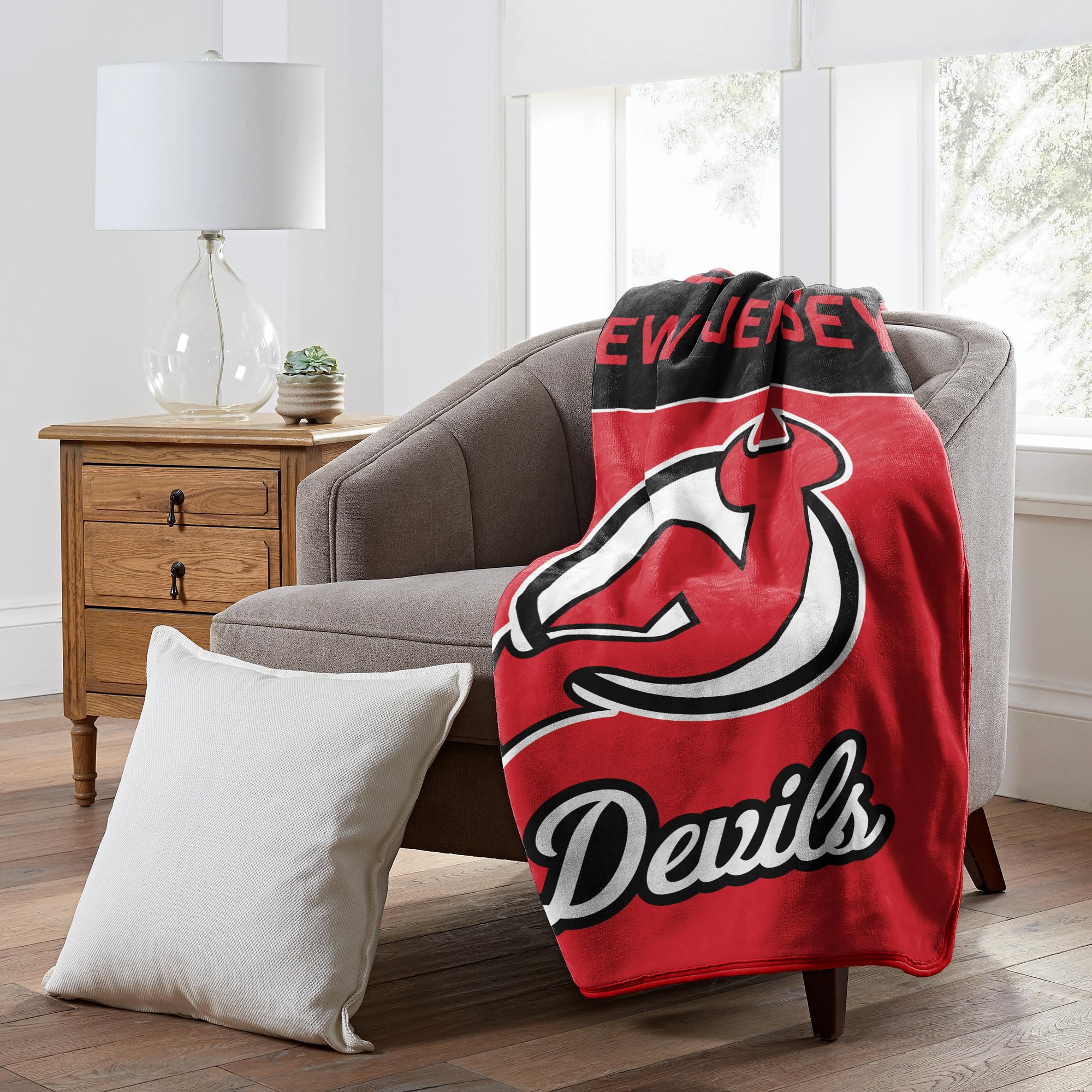 NORTHWEST Officially Licensed New Jersey Devils NHL Team Throw Blanket 46″×60″ – Licensed Microfiber Throw with Hockey Logos for Fans, Dorms, Game Day Couches & Fan Caves