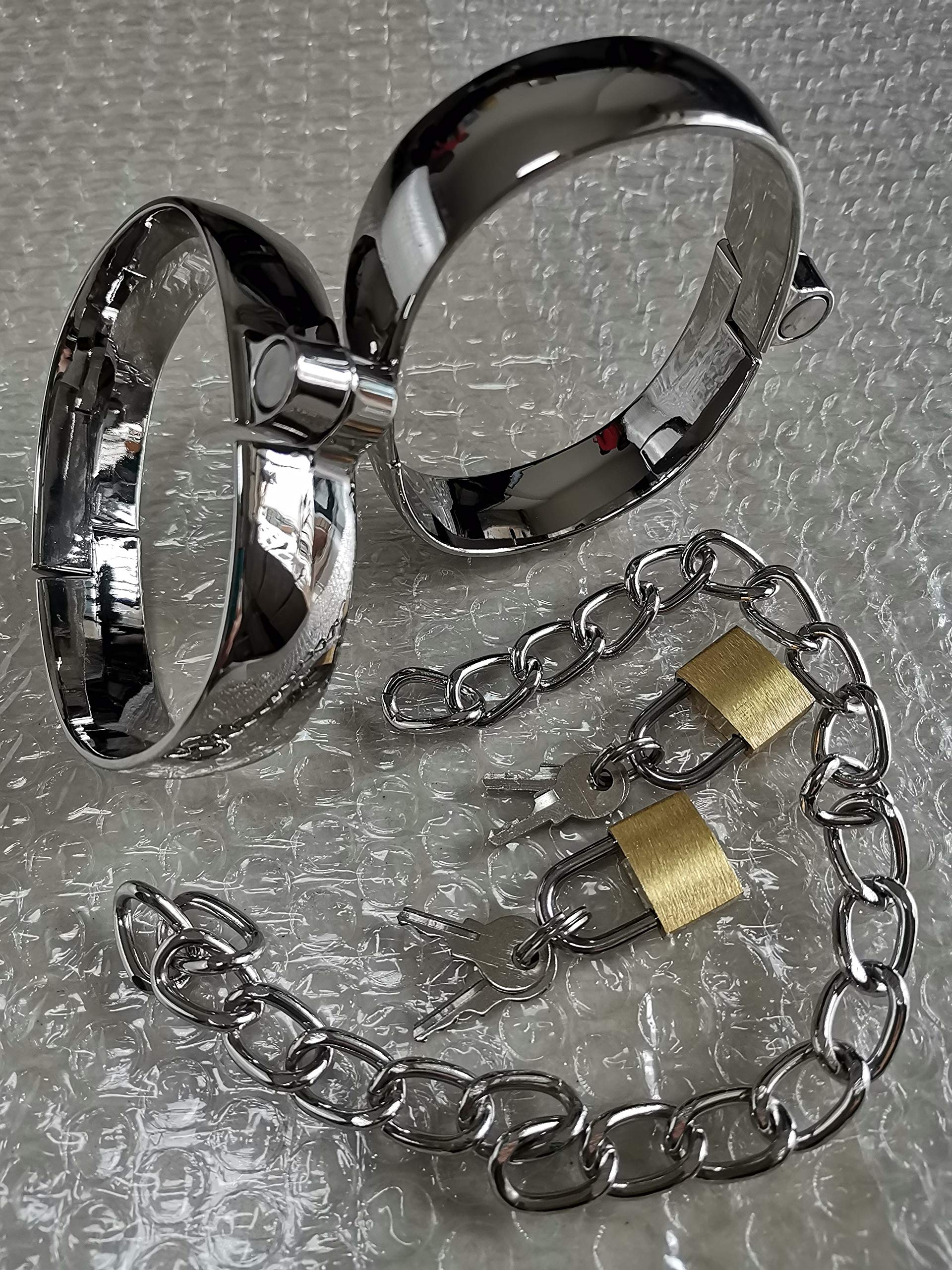 Un par de esposas de acero inoxidable para BDSM y hombres (7 x 5 cm).