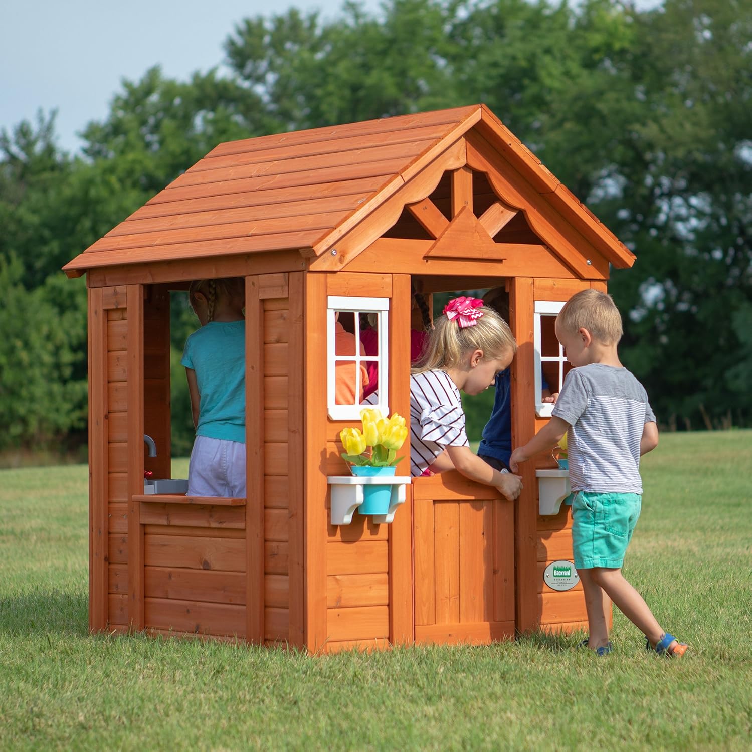Backyard Discovery Timberlake Cedar Wooden Kids Playhouse Cottage with Play Kitchen, Snack Bar, Half Door, Toy Phone, Windows, Flowerpot Holders for Outdoor Imaginative Play