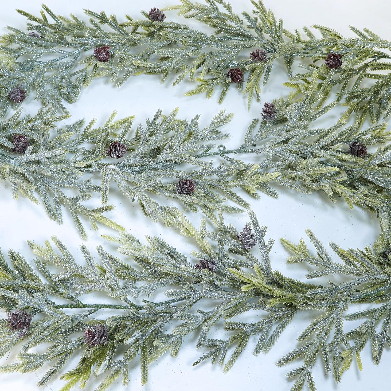 Winlyn 6' Artificial Frosted Christmas Pine Garland with Pine Cones Glitter Winter Greenery Garland for Christmas Winter Wedding Holiday Table Runner Centerpiece Doorway Season Mantel Decor - Image 2
