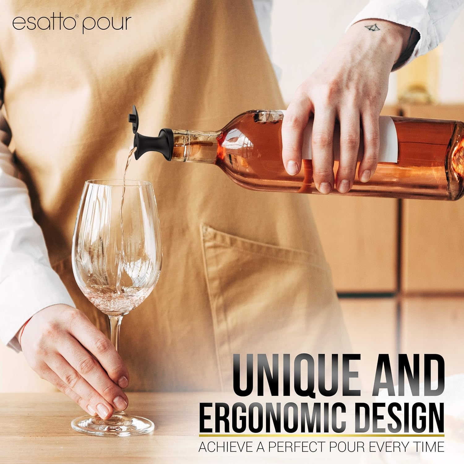 A person pouring liquid from a bottle fitted with an Esatto Pour and Seal pourer into a glass.