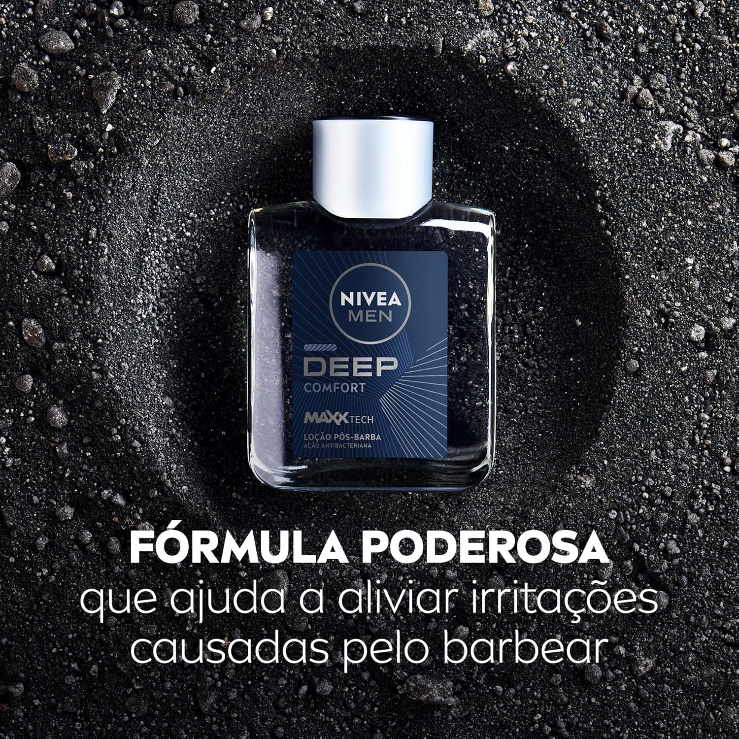 Frontal view of the product with a black granular surface background forming a circle around the bottle